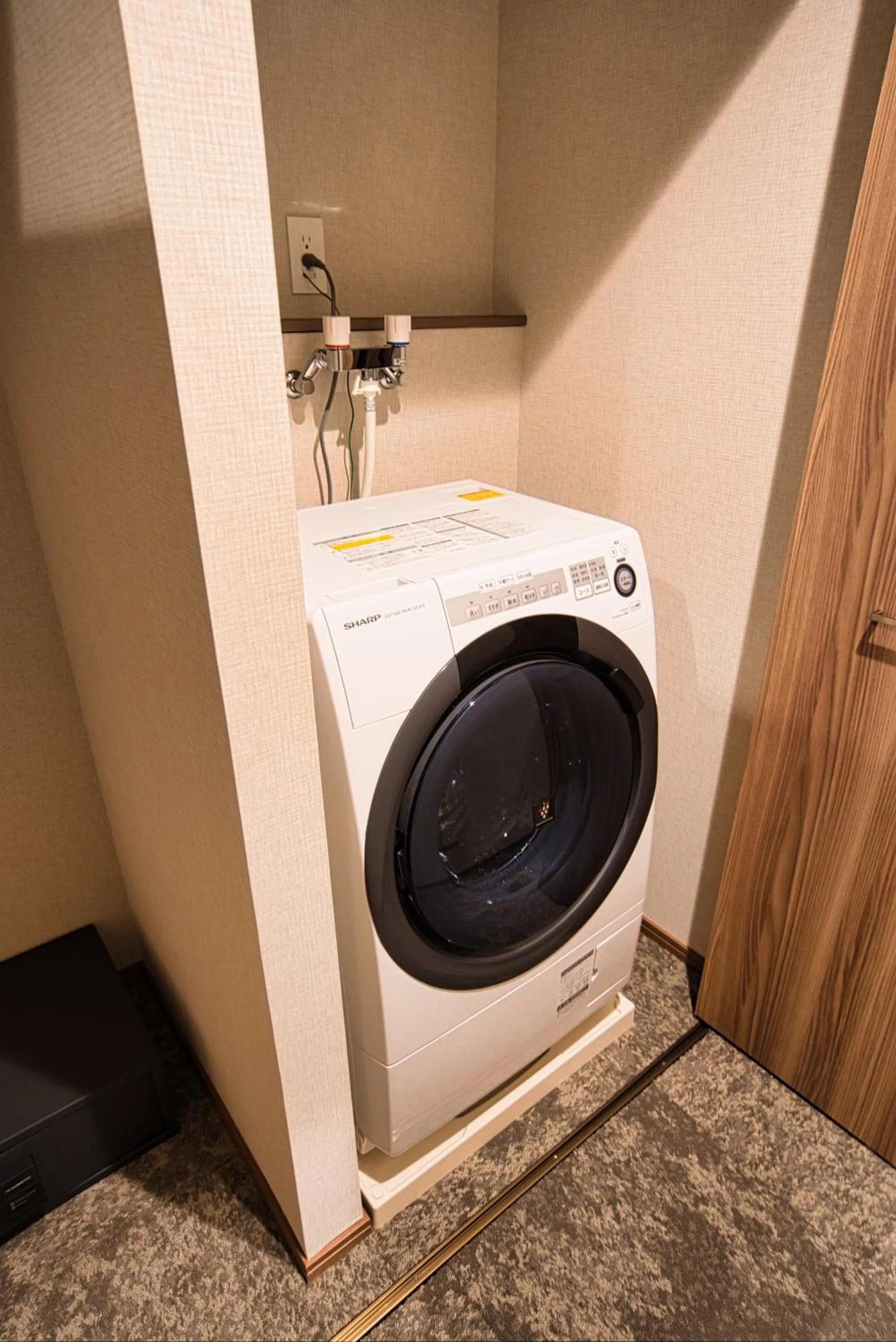washing machine in Winery Hotel and Condominium HITOHANA