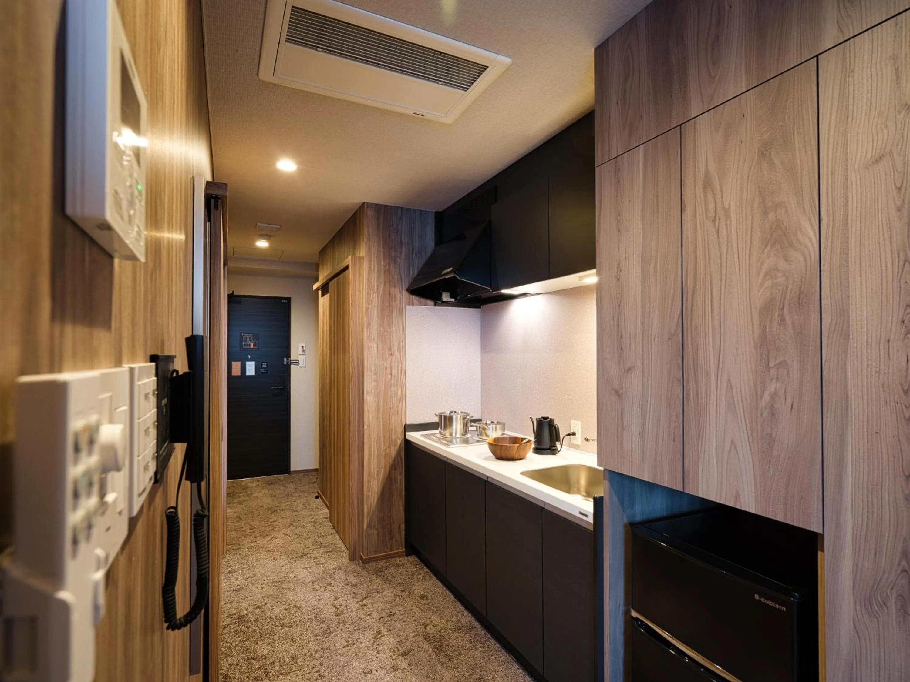 Kitchen or kitchenette in Winery Hotel and Condominium HITOHANA