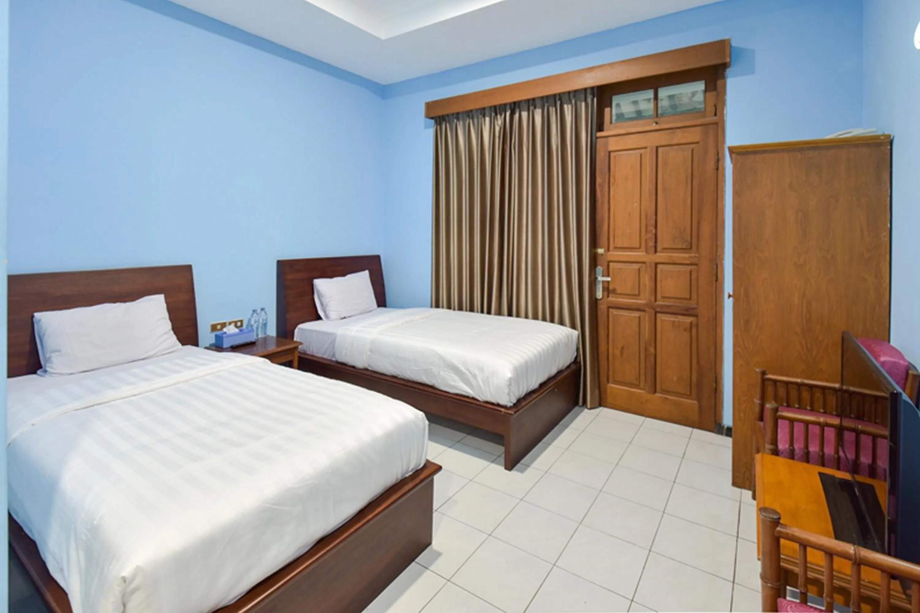 Bed in Sekar Ayu Hotel Malioboro Mitra RedDoorz