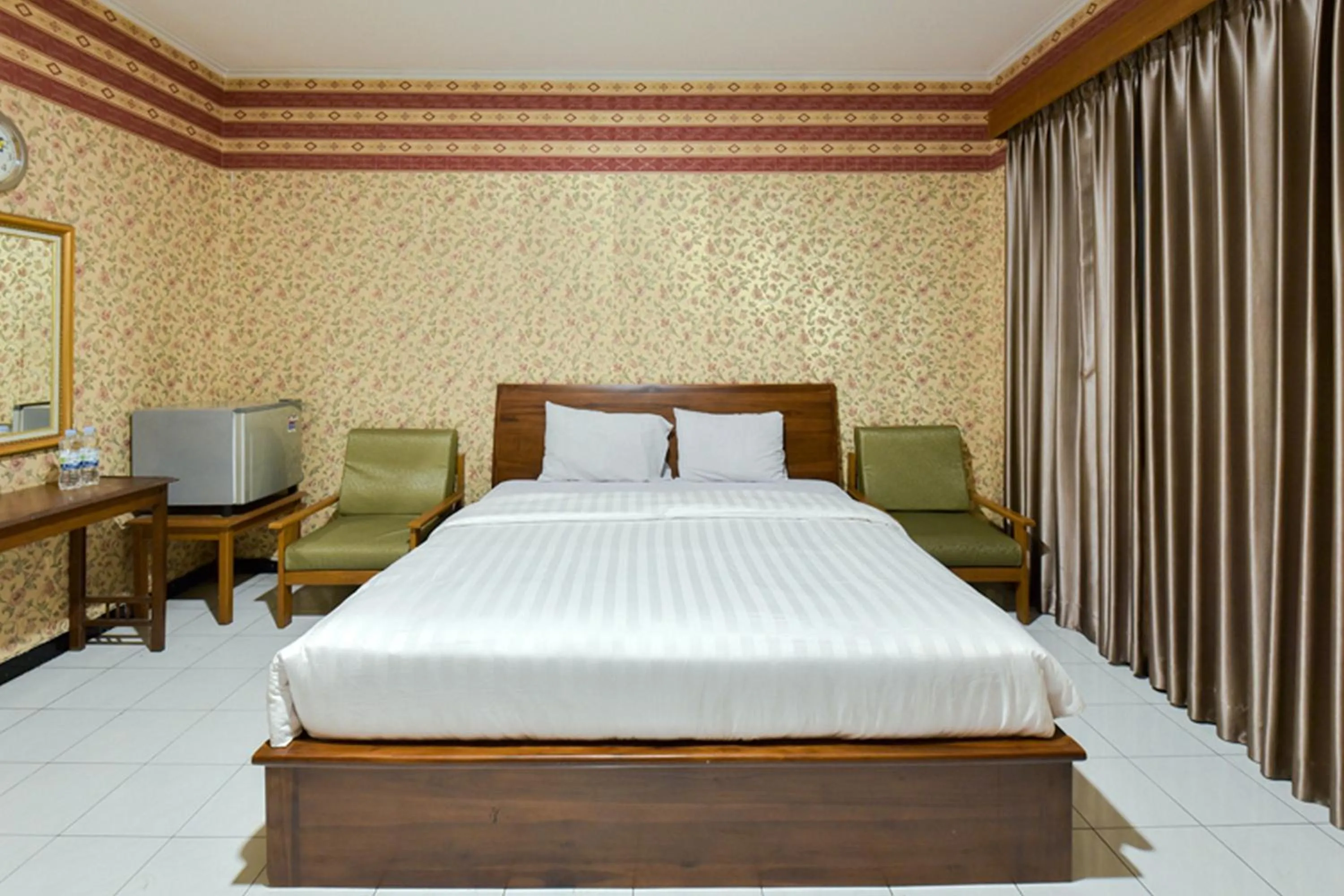 Bed in Sekar Ayu Hotel Malioboro Mitra RedDoorz