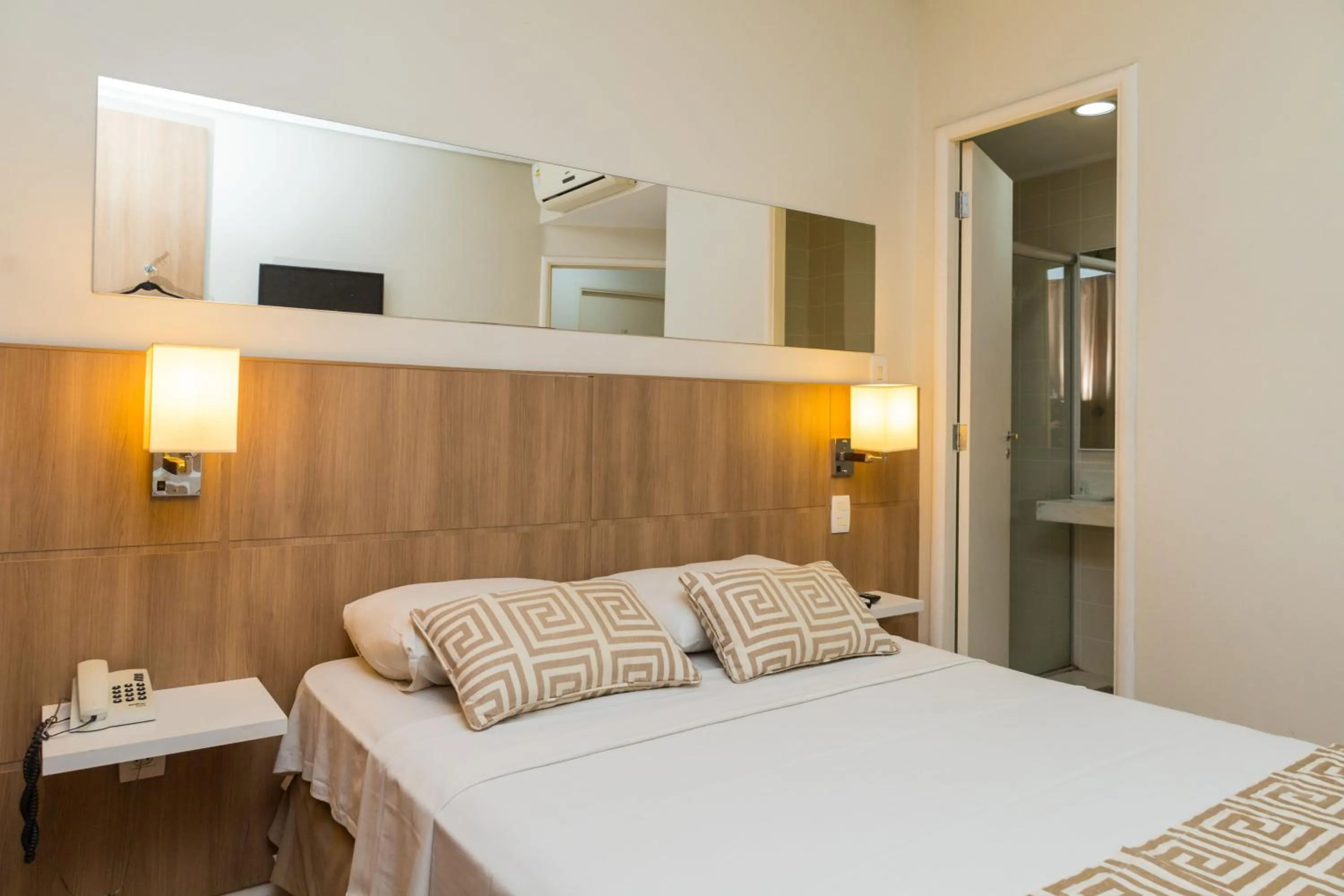 Bed in Golden Suíte Hotel