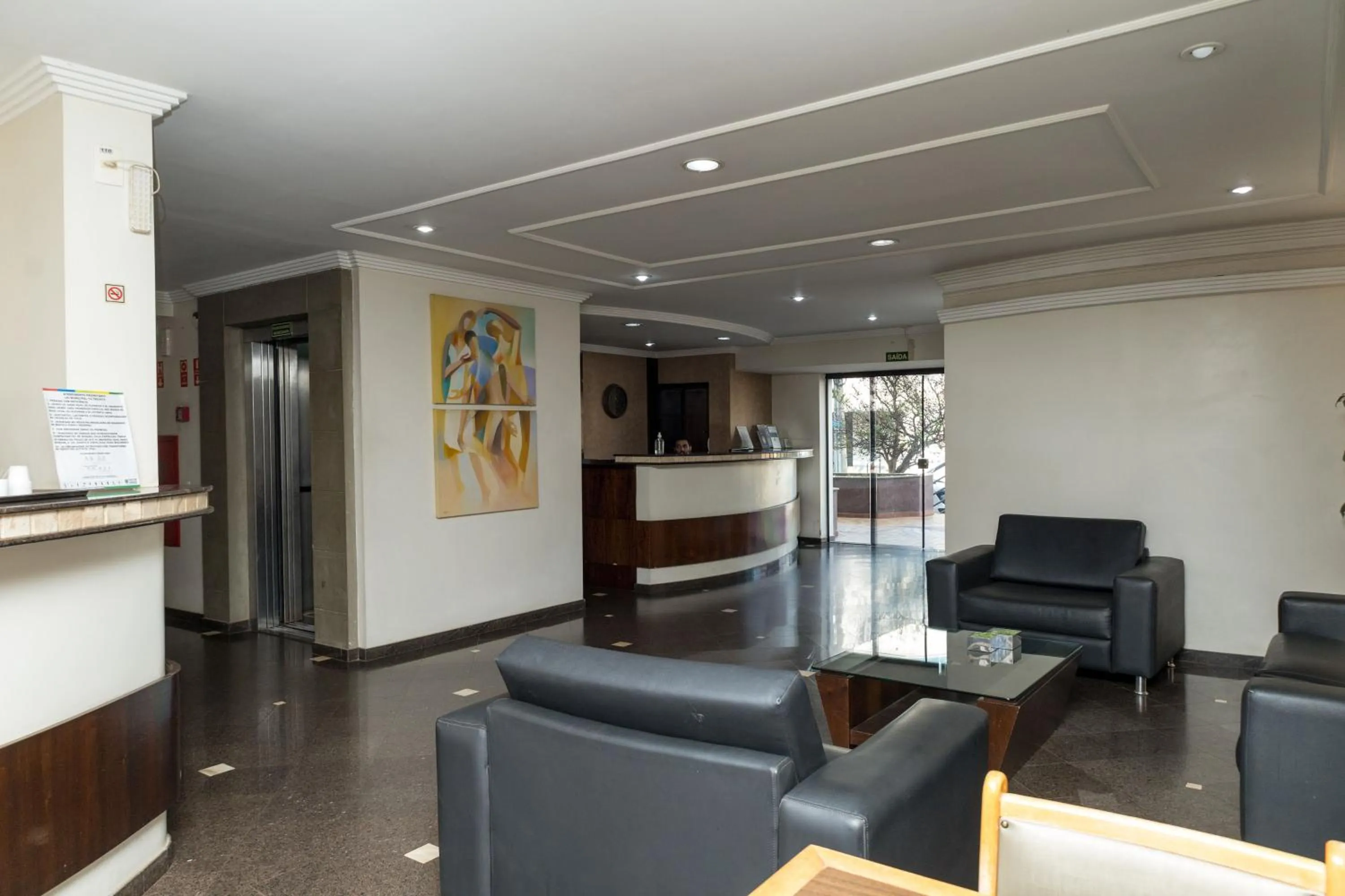 Lobby or reception in Golden Suíte Hotel