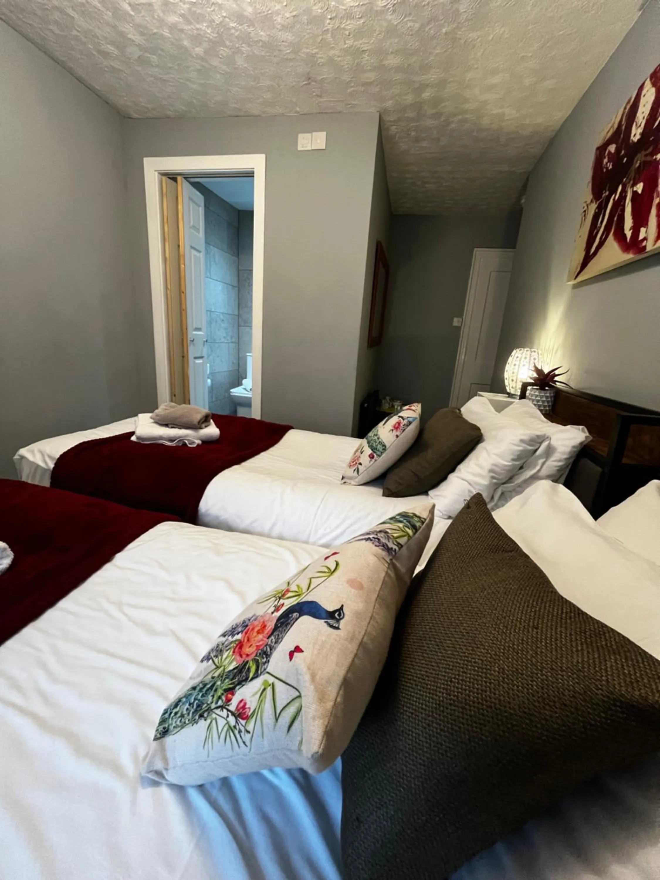 Bed in Relax Inn Guest House