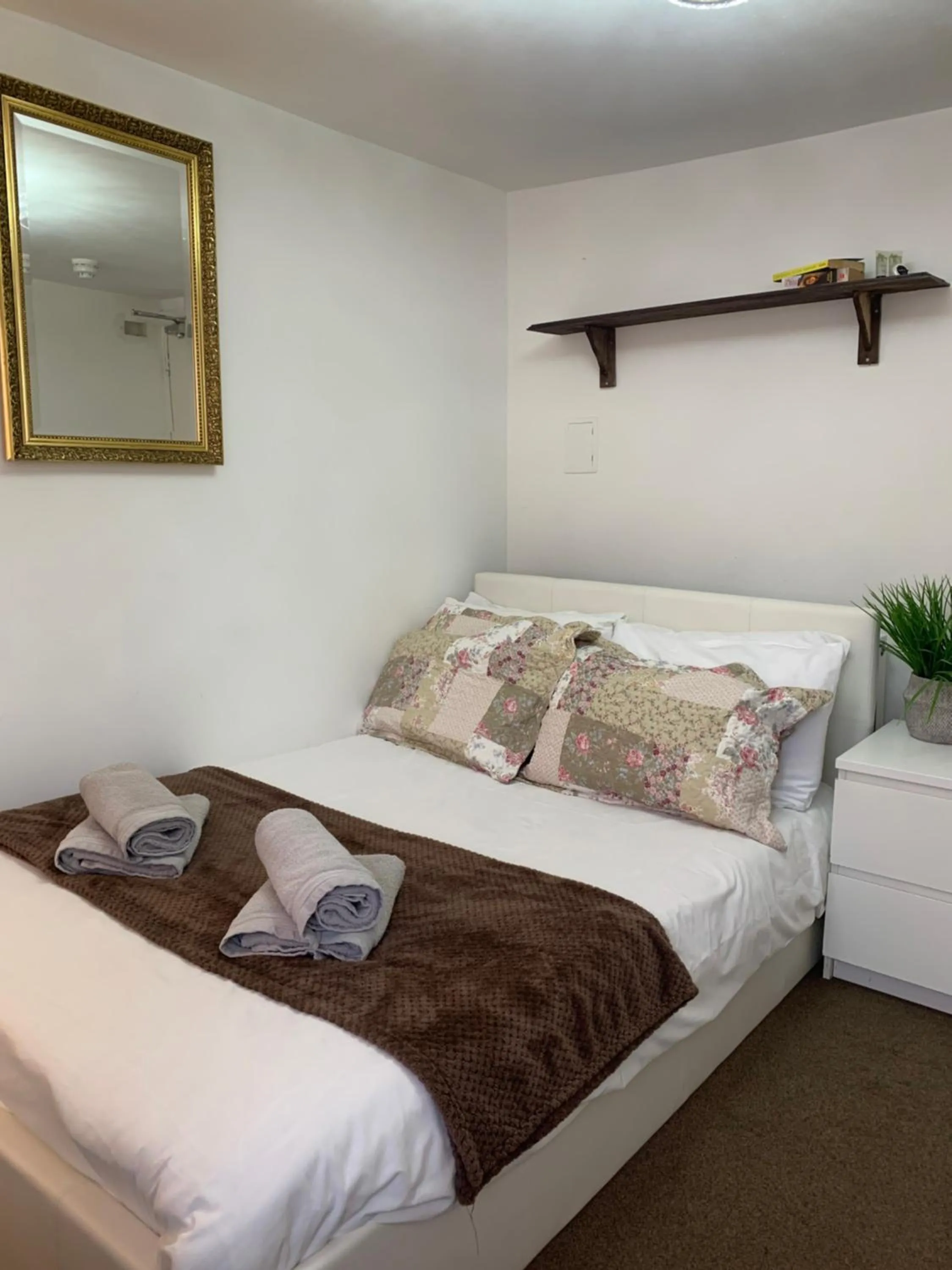 Bed in Relax Inn Guest House