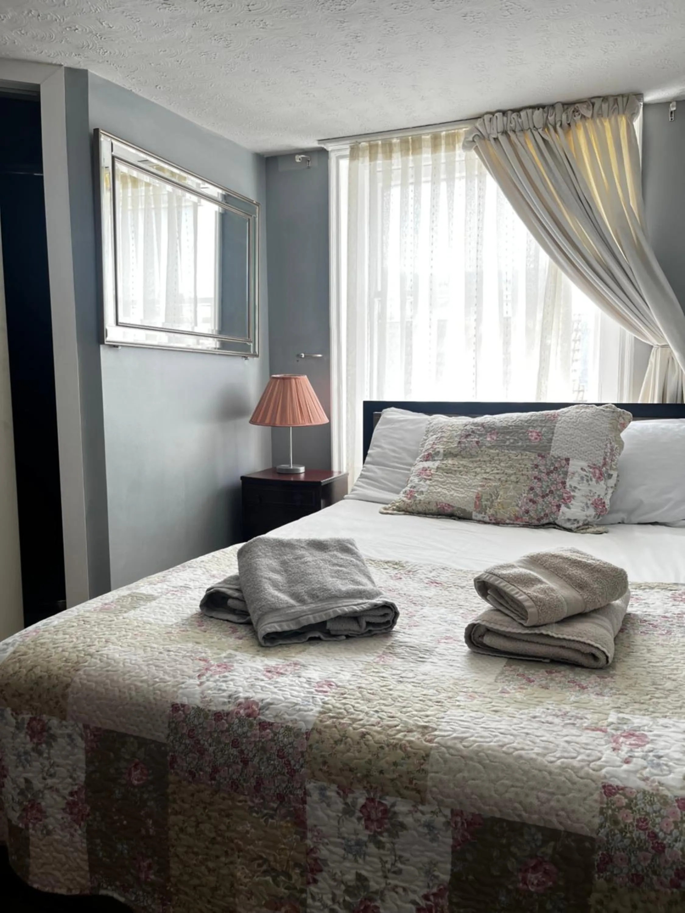 Bed in Relax Inn Guest House