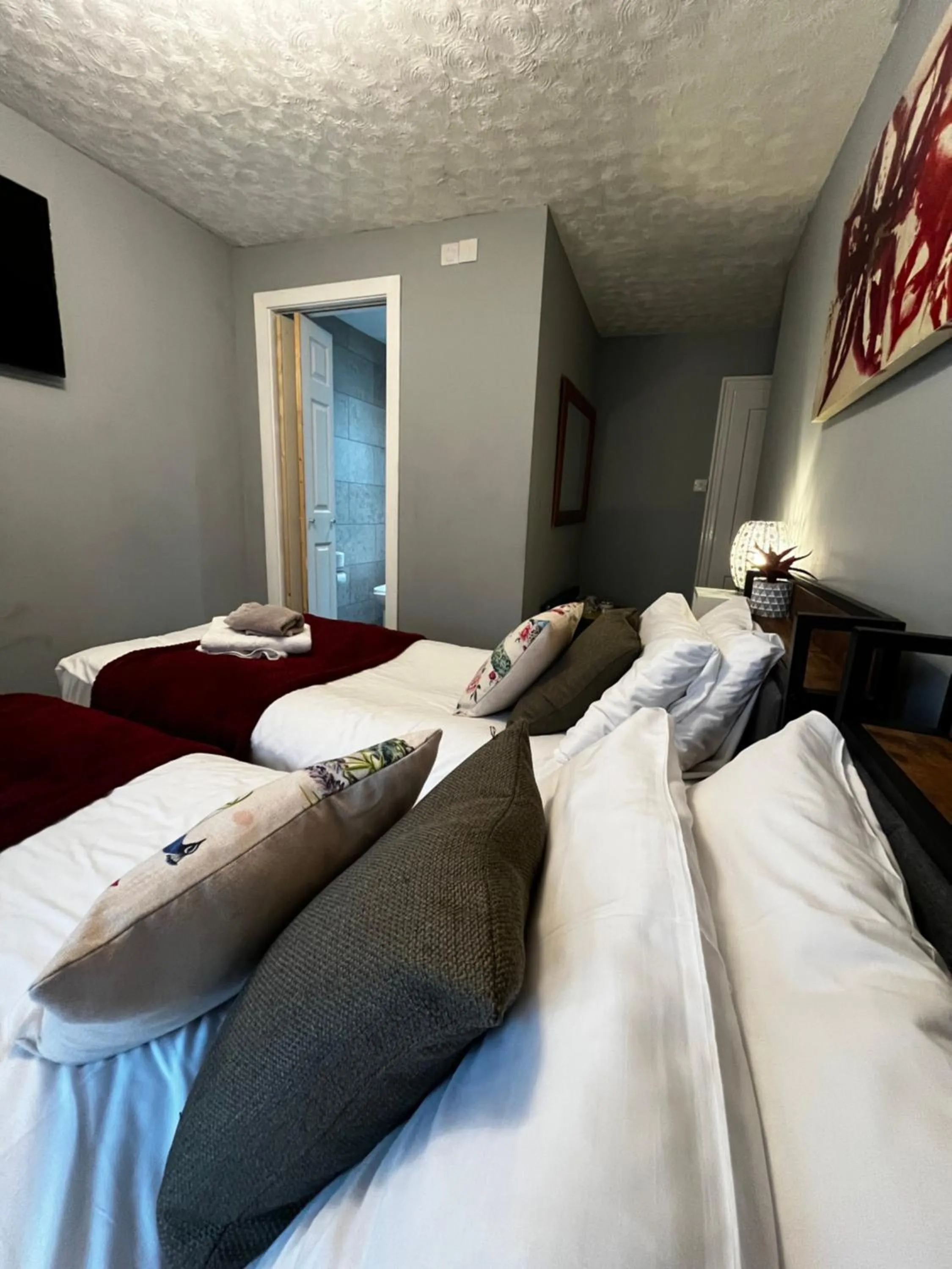 Bed in Relax Inn Guest House