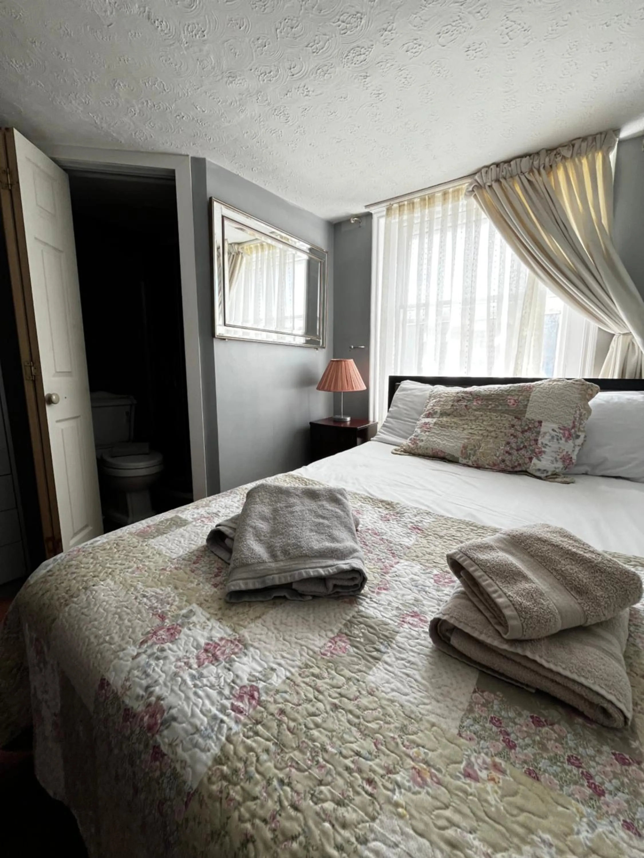 Bed in Relax Inn Guest House