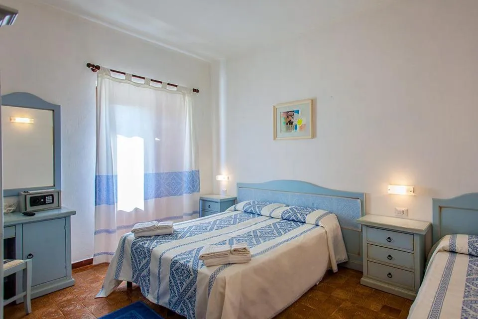 Bed in Hotel Sandalyon