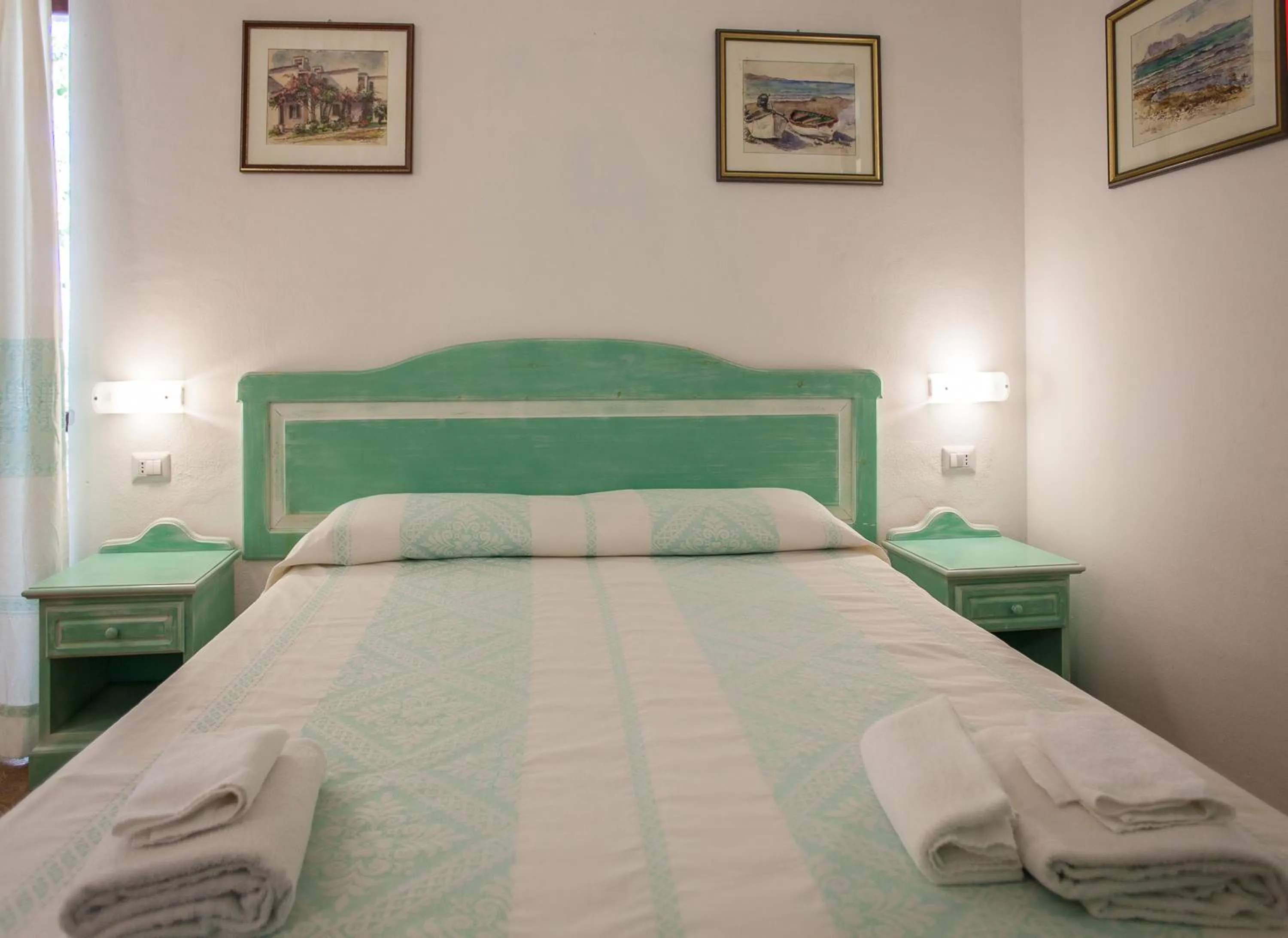 Bed in Hotel Sandalyon