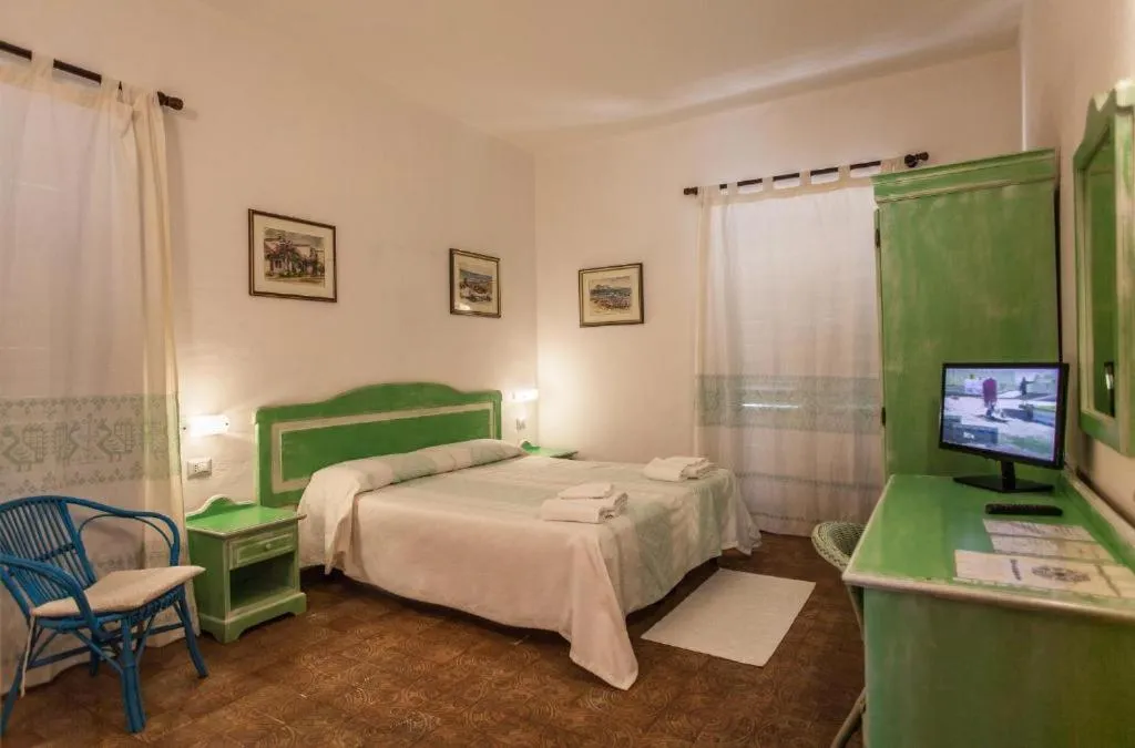 Bed in Hotel Sandalyon