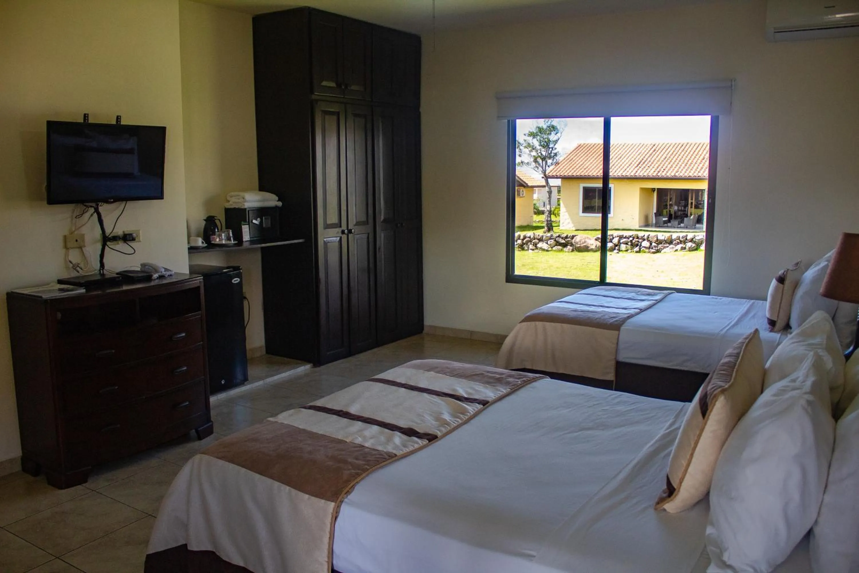 Bed in Hacienda Los Molinos Boutique Hotel & Villas