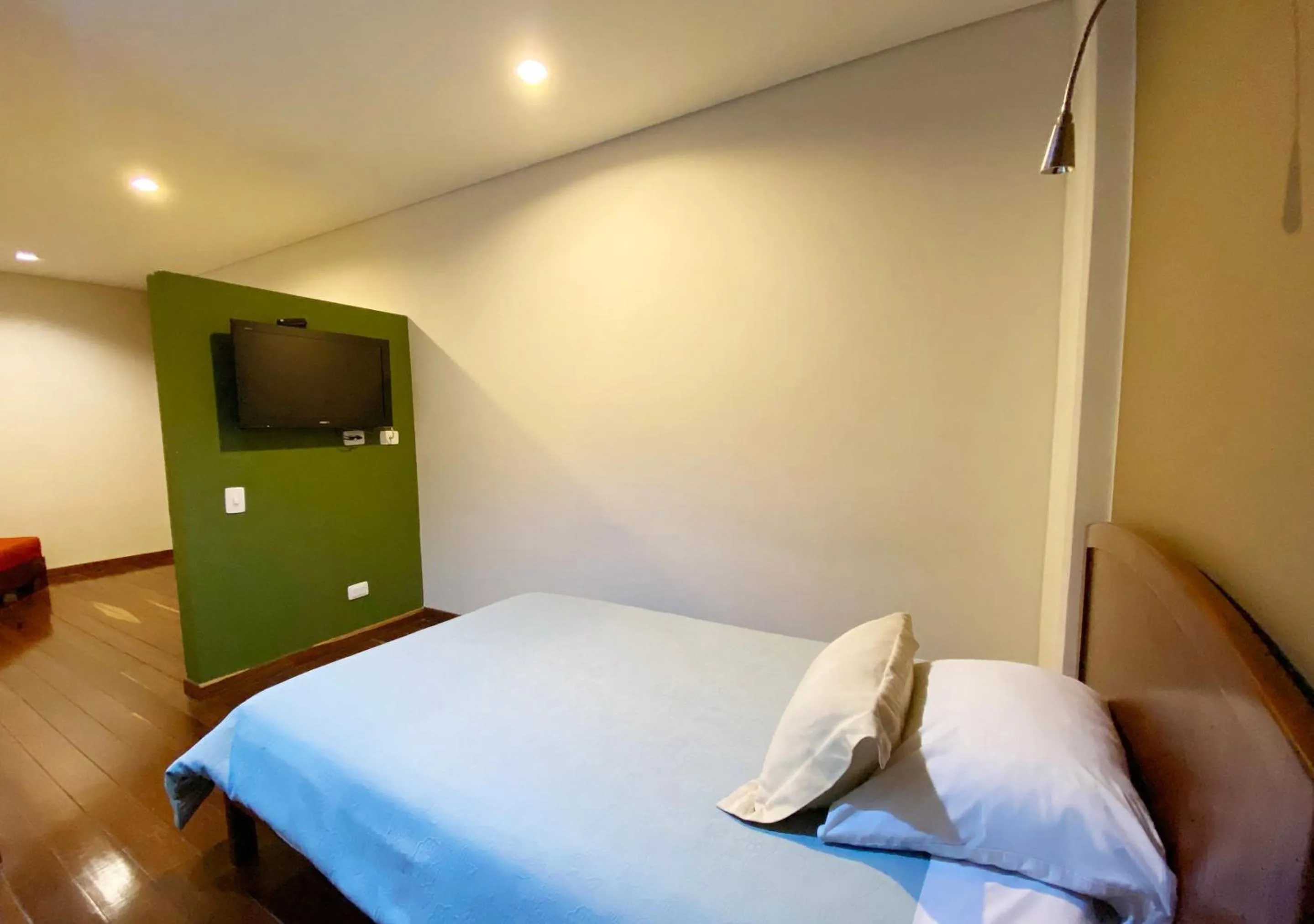 Bed in Apartasuites BellHouse Bogotá