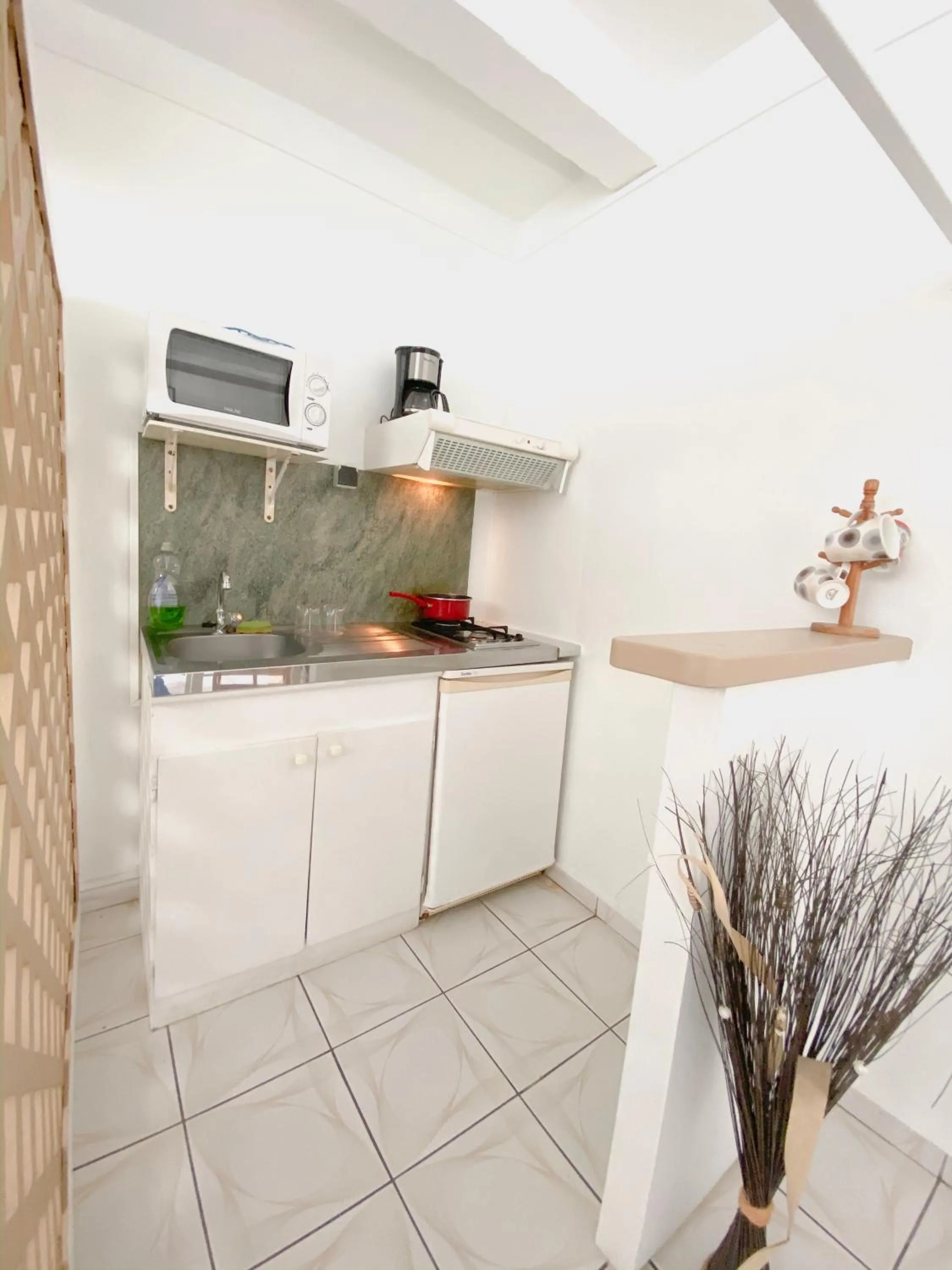 Kitchen or kitchenette in Hotel Oasis