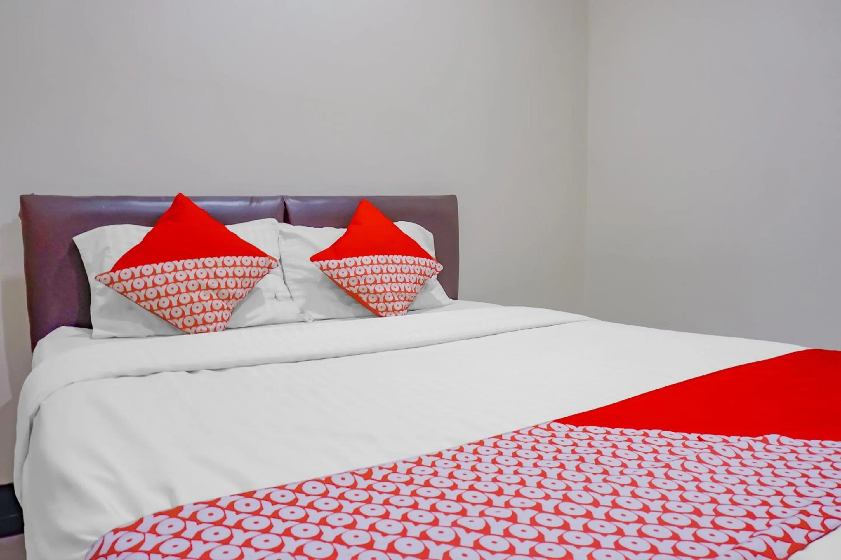 Bedroom in OYO 117 Blueberry Homestay