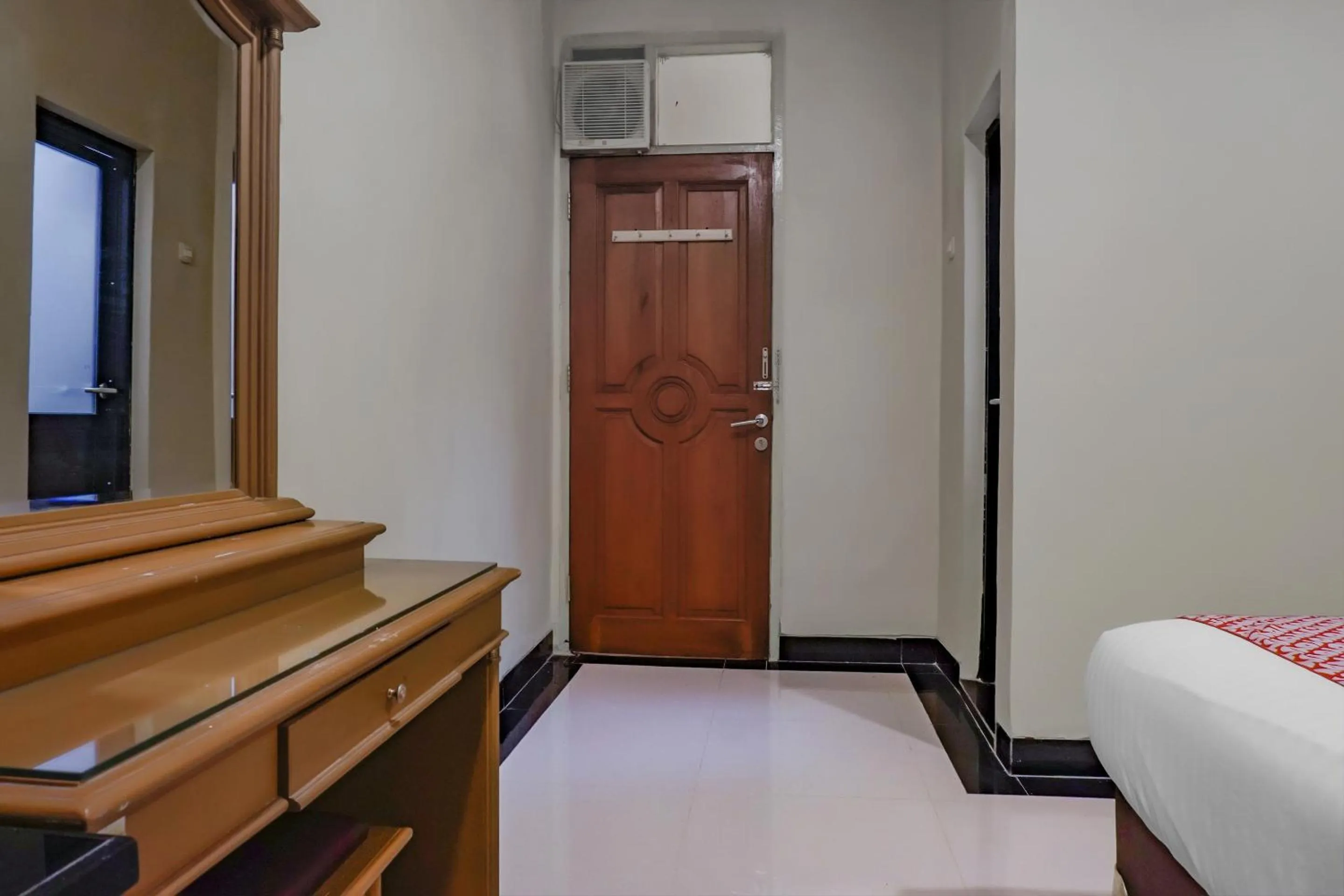 Photo of the whole room, TV/Entertainment Center in OYO 117 Blueberry Homestay