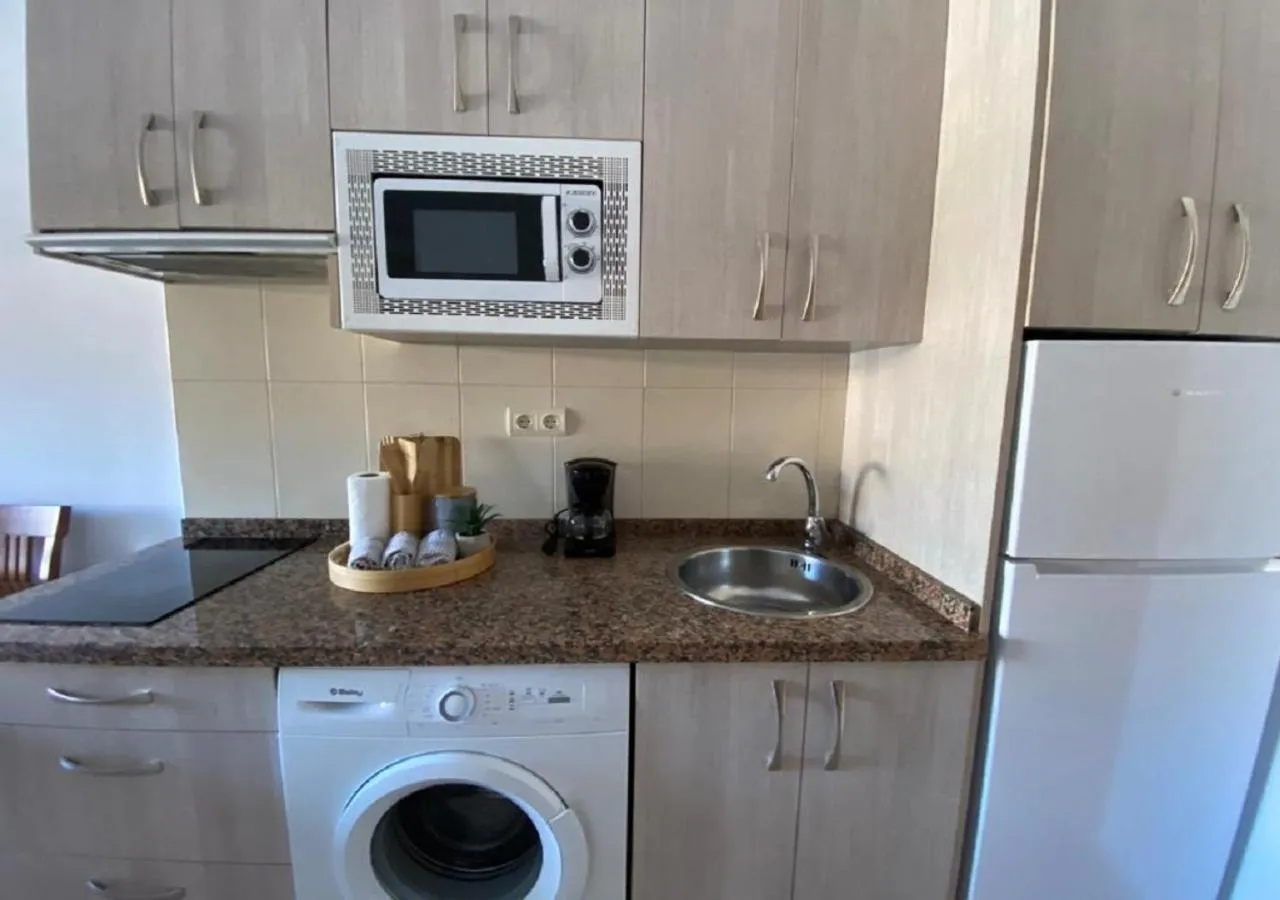 Kitchen or kitchenette in Apartamentos Benal Beach Group