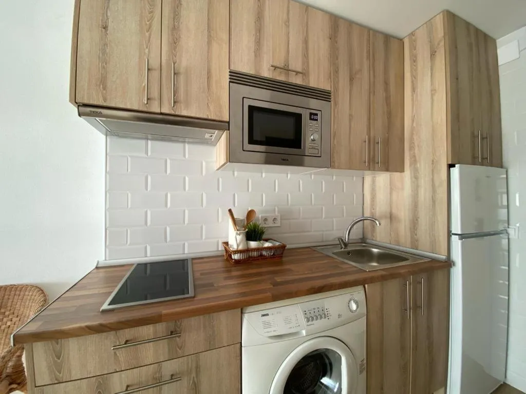 Kitchen or kitchenette in Apartamentos Benal Beach Group