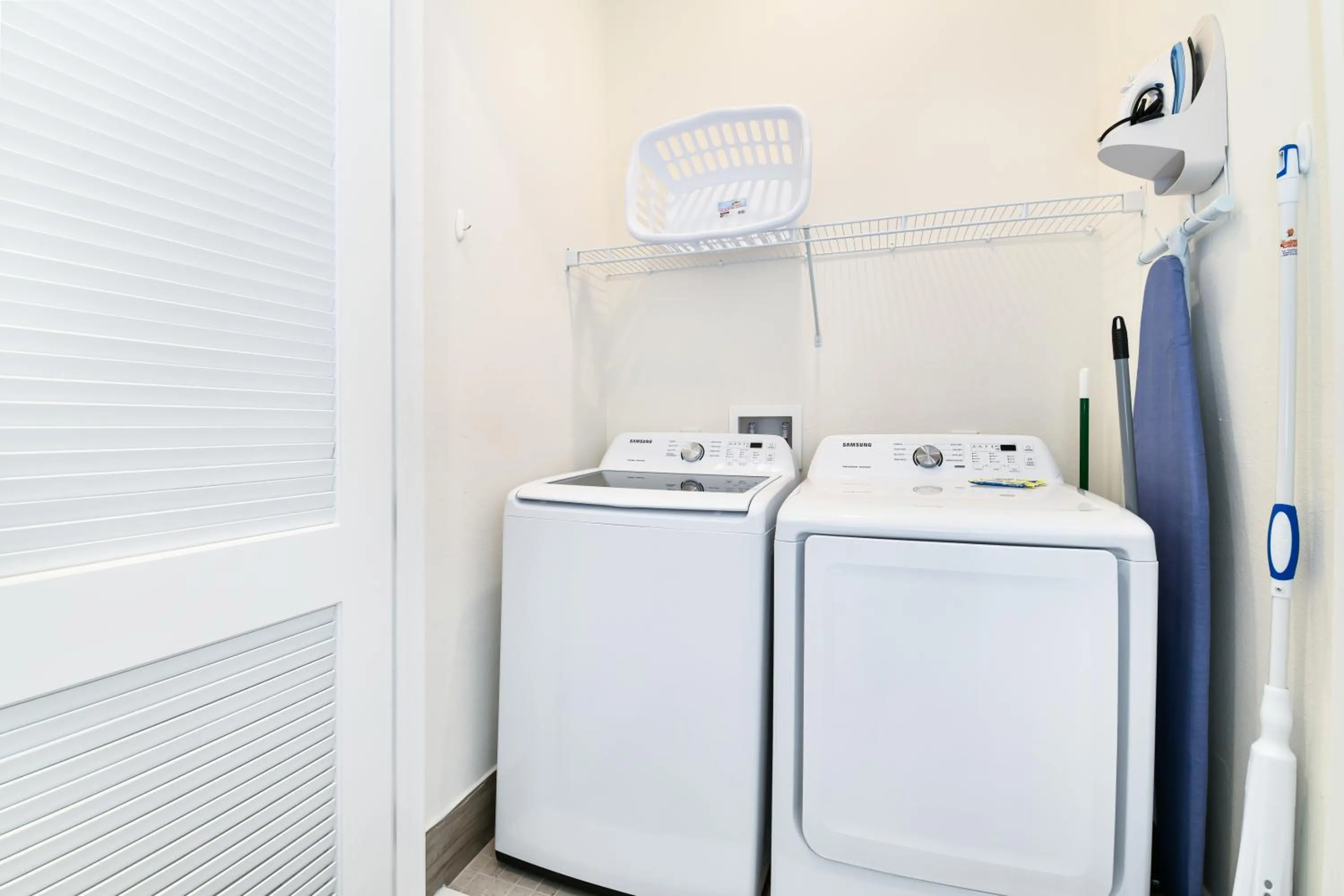 washing machine in Margaritaville Cottages Orlando by Rentyl with H2O Waterpark