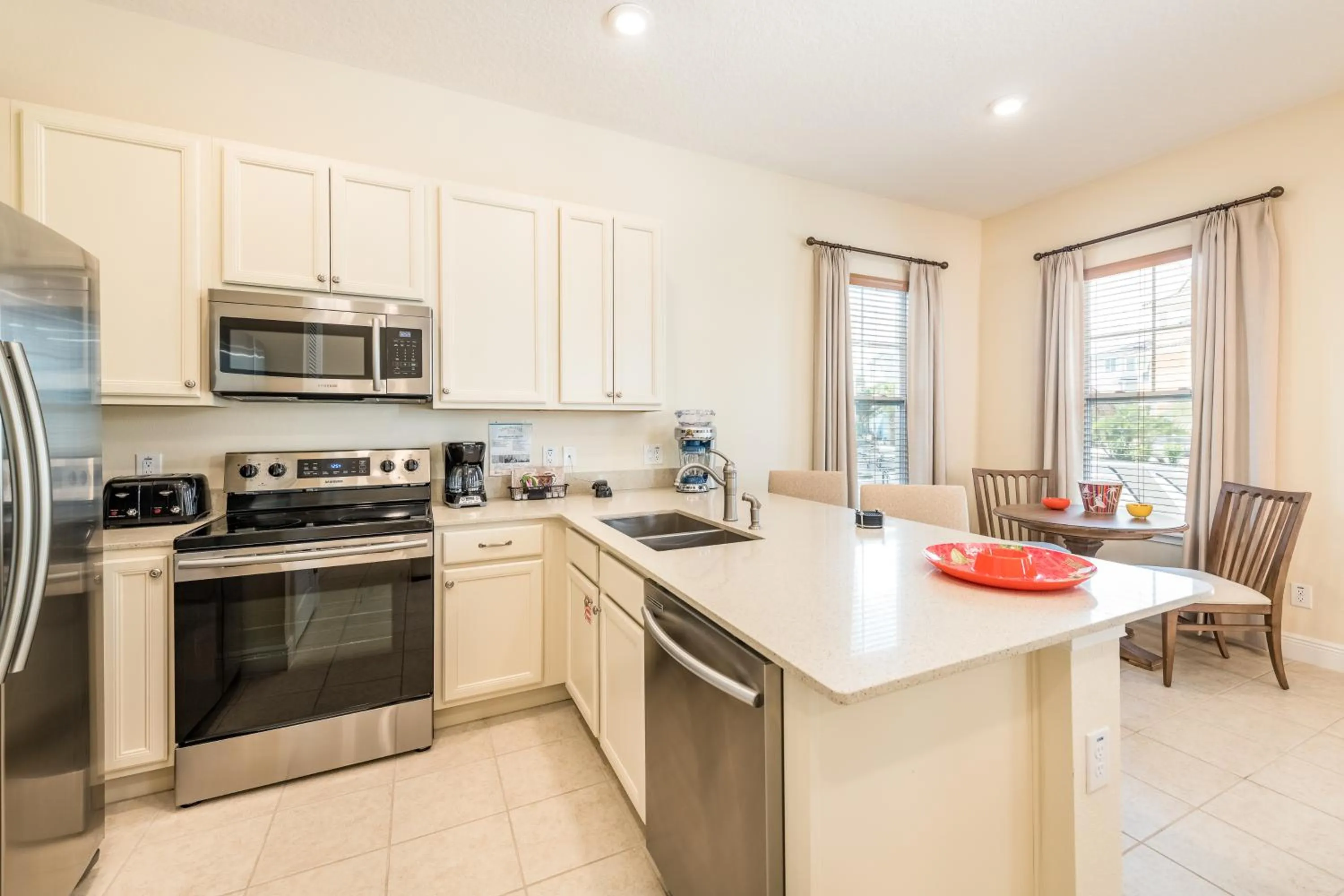 Kitchen or kitchenette in Margaritaville Cottages Orlando by Rentyl with H2O Waterpark