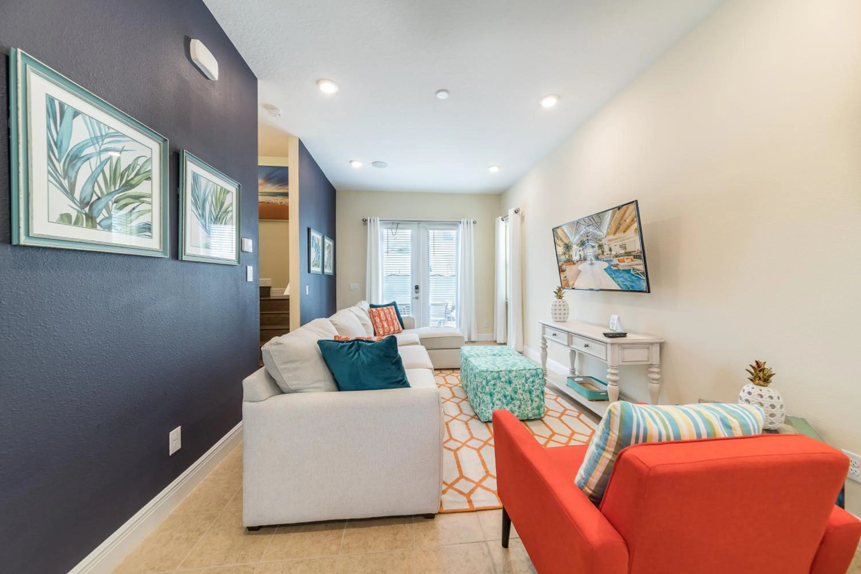 Living room in Margaritaville Cottages Orlando by Rentyl with H2O Waterpark