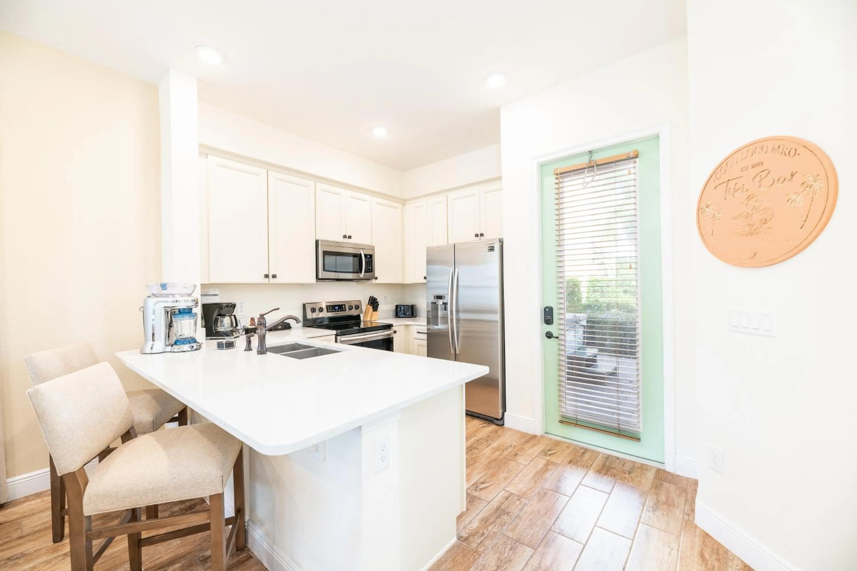 Kitchen or kitchenette in Margaritaville Cottages Orlando by Rentyl with H2O Waterpark