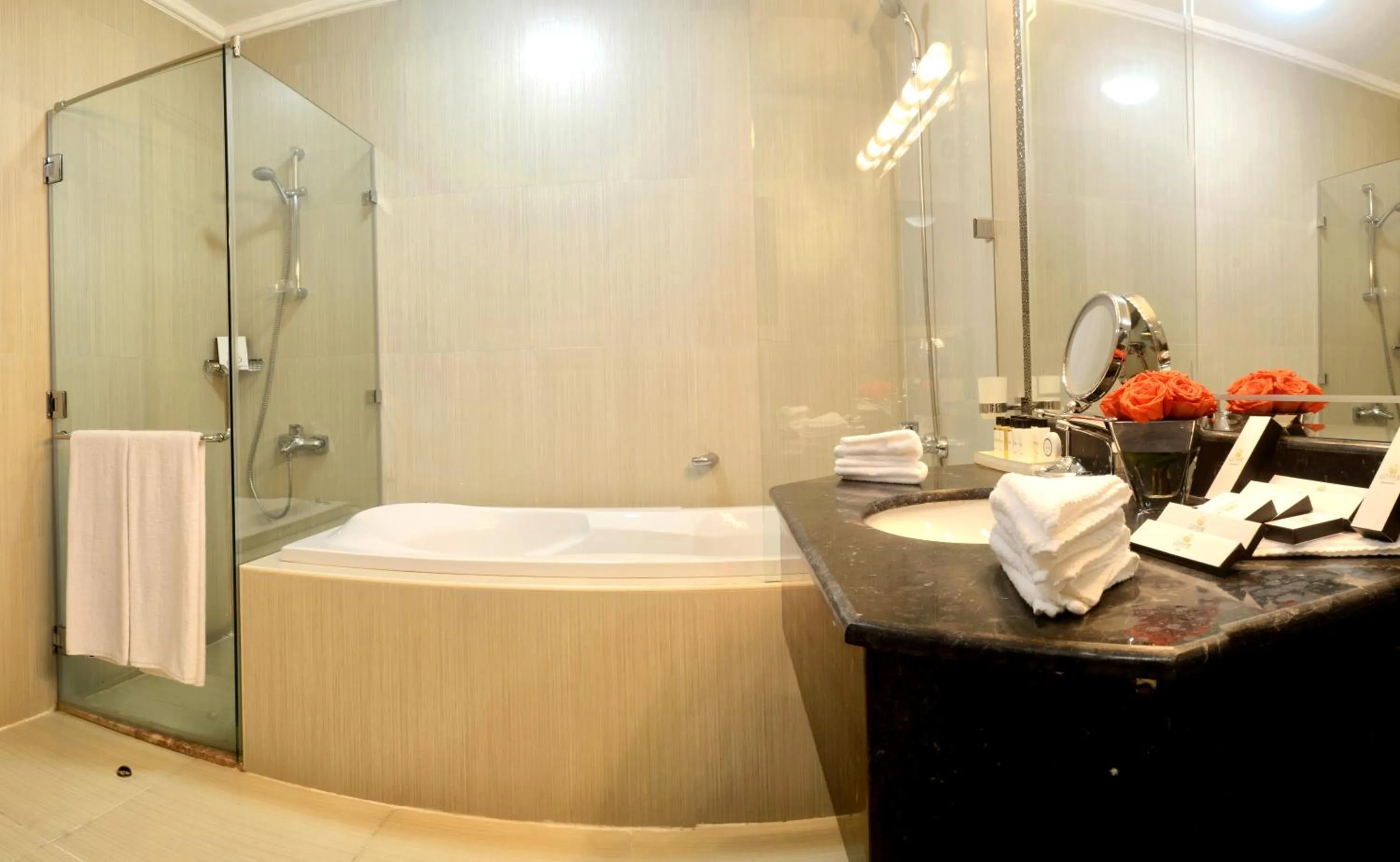 Bathroom in Magnum Hotel & Suites West Bay