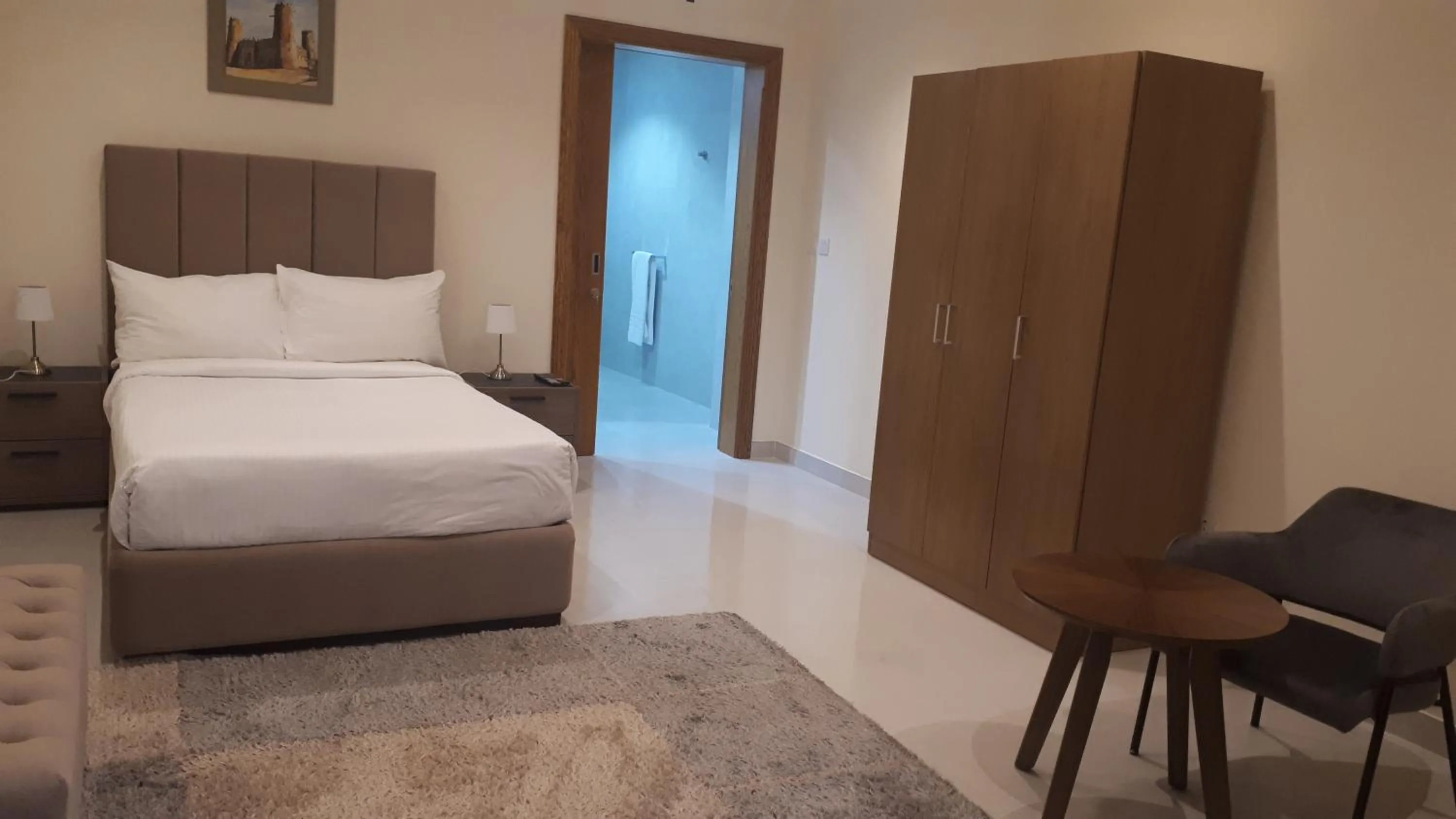 Bedroom in Magnum Hotel & Suites West Bay