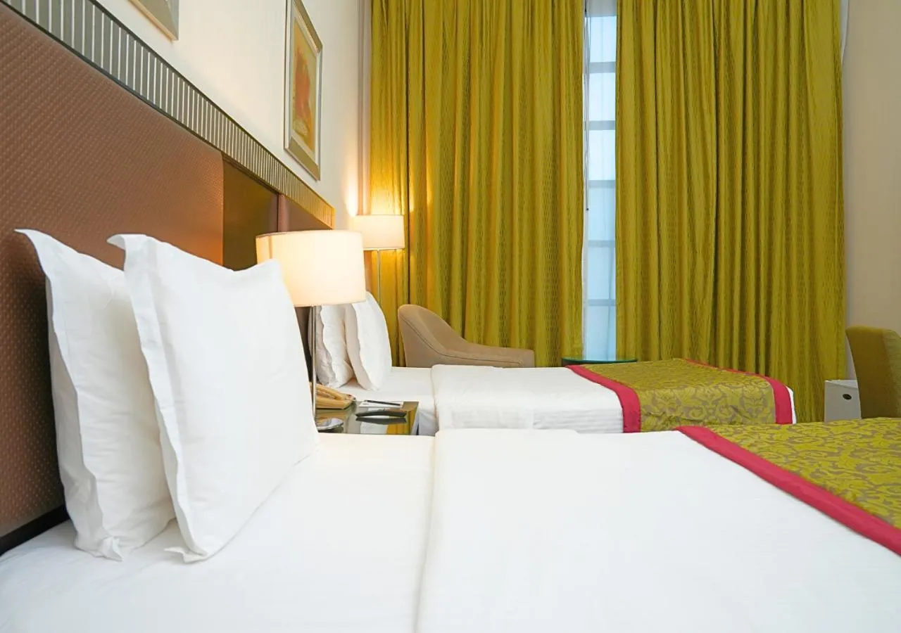 Bedroom, Bed in Millennium Central Doha