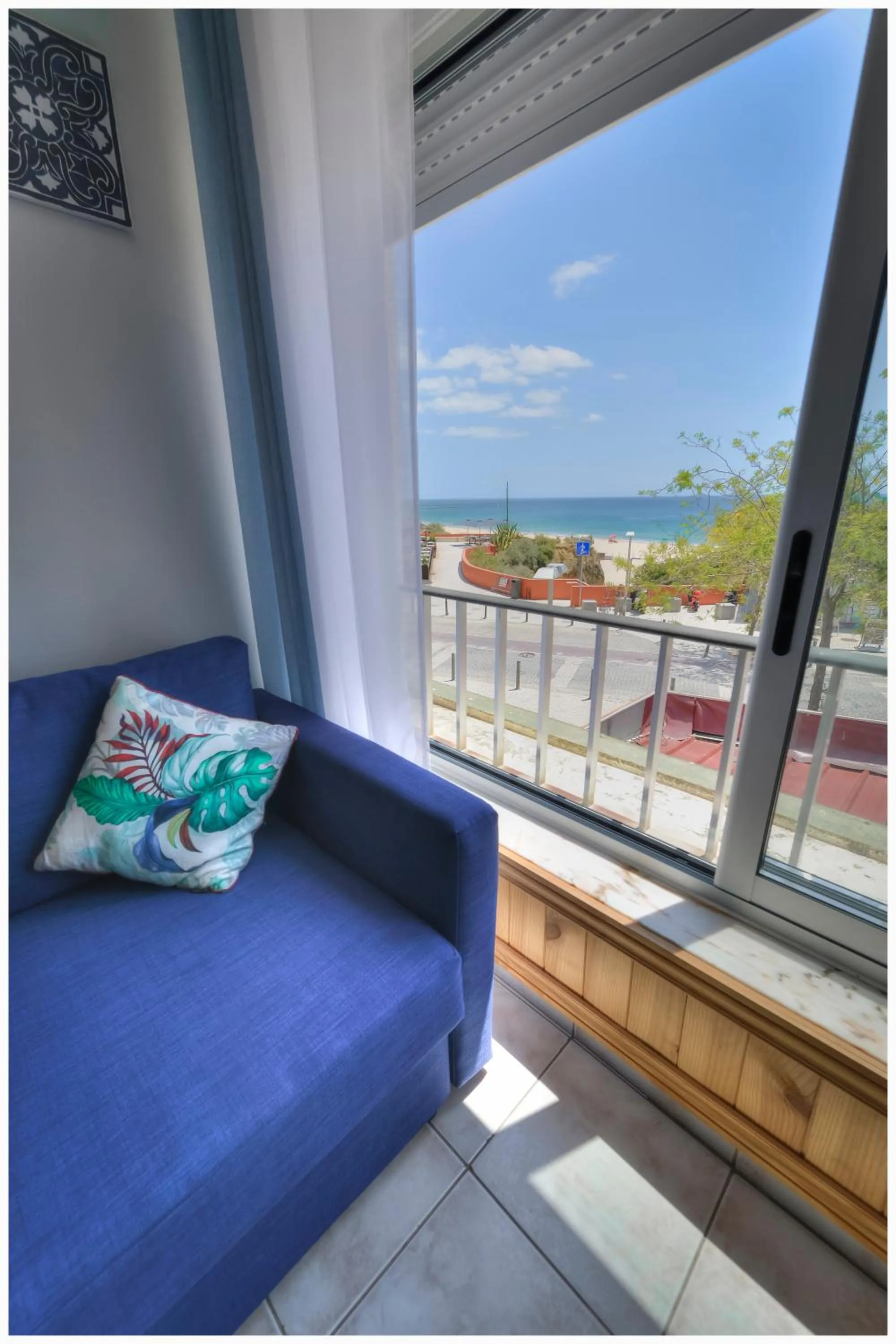 Sea view, Bed in Apartamentos Belo Horizonte