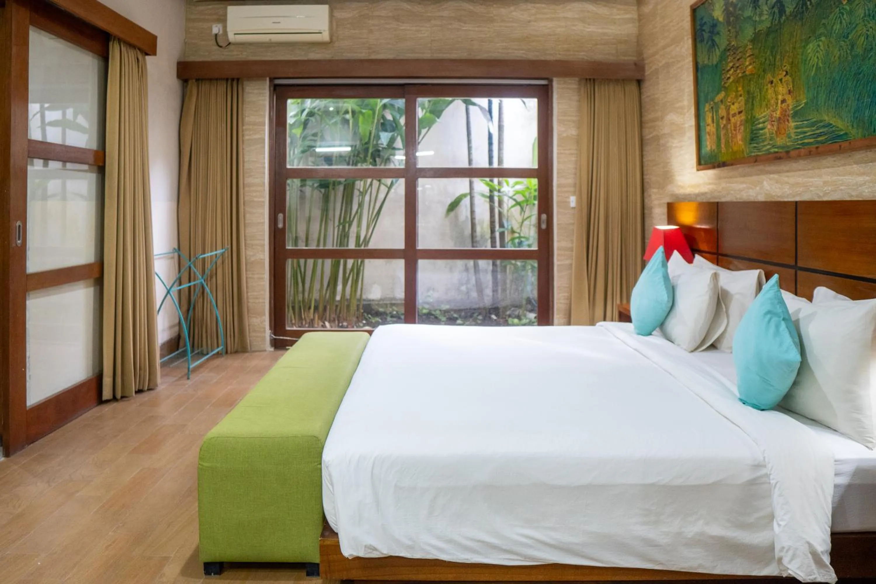 Bed in The Green Zhurga Suite Seminyak
