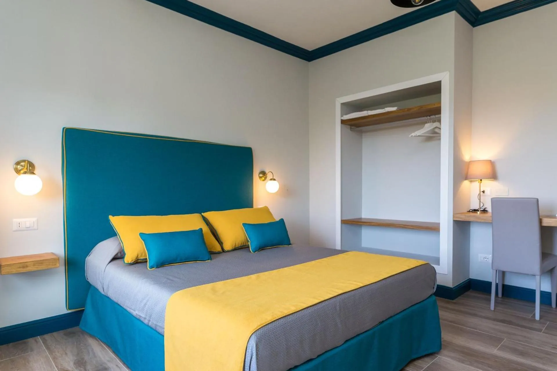 Bed in Sorrento Pool&Suites