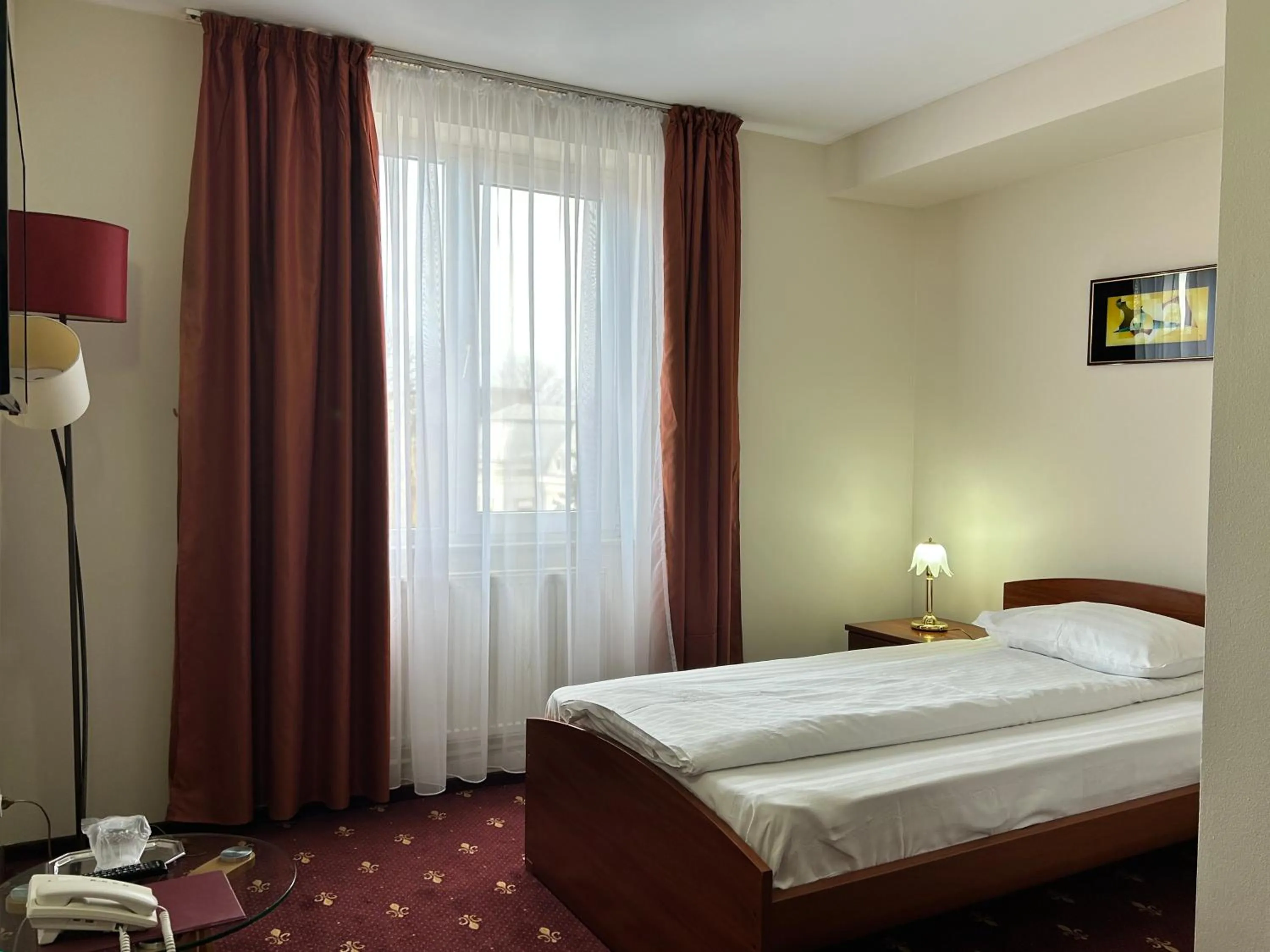 Bed in Hotel Bistrita