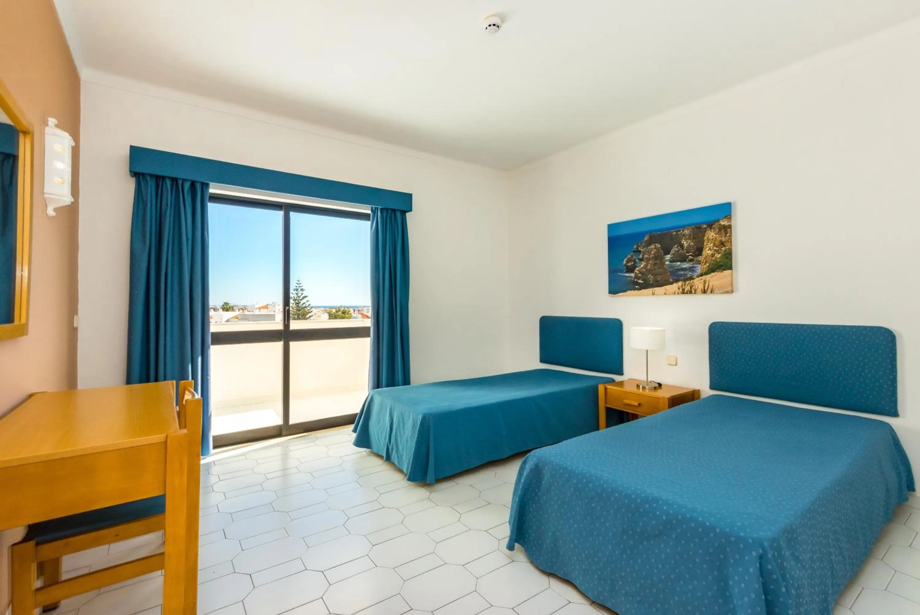 Bed in Janelas do Mar Apartamentos Turisticos