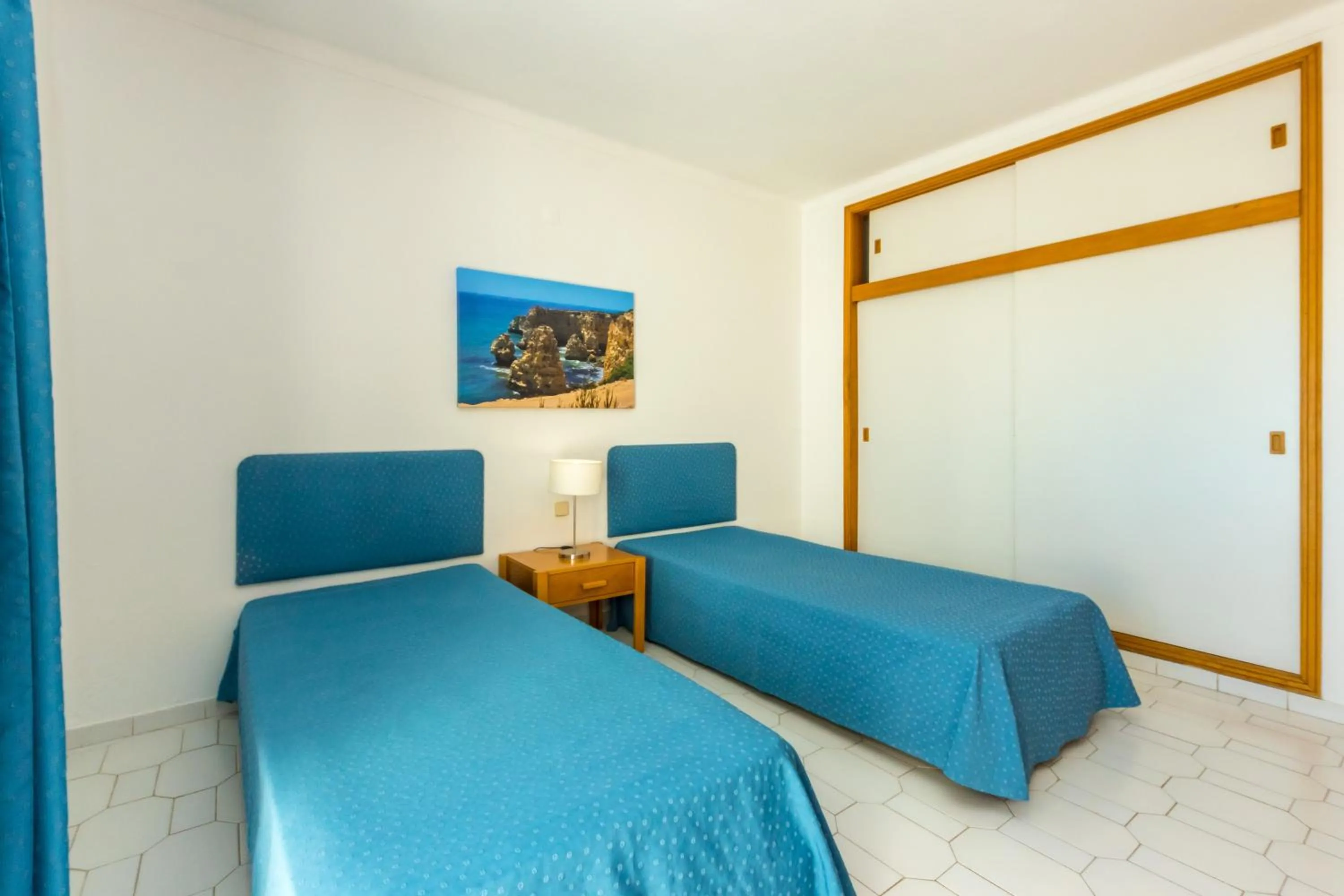 Bed in Janelas do Mar Apartamentos Turisticos