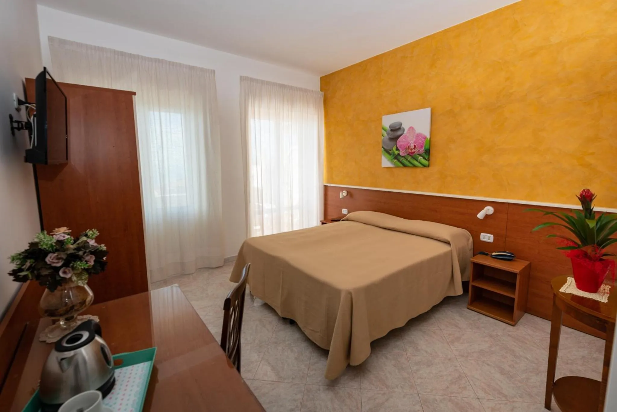 Bed in Hotel Baia Verde