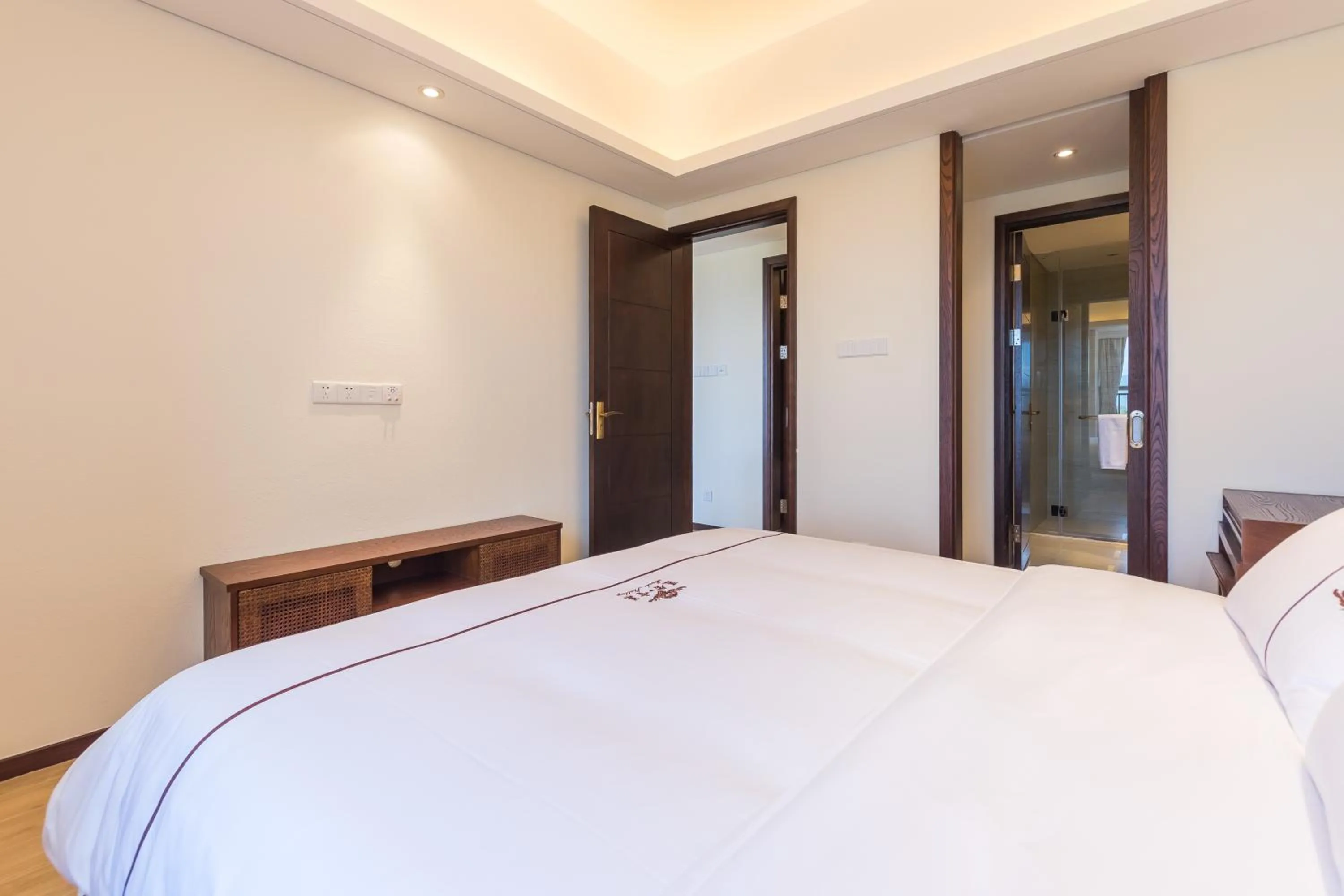 Bed in Sanya Haitang Bay Mushe Villa