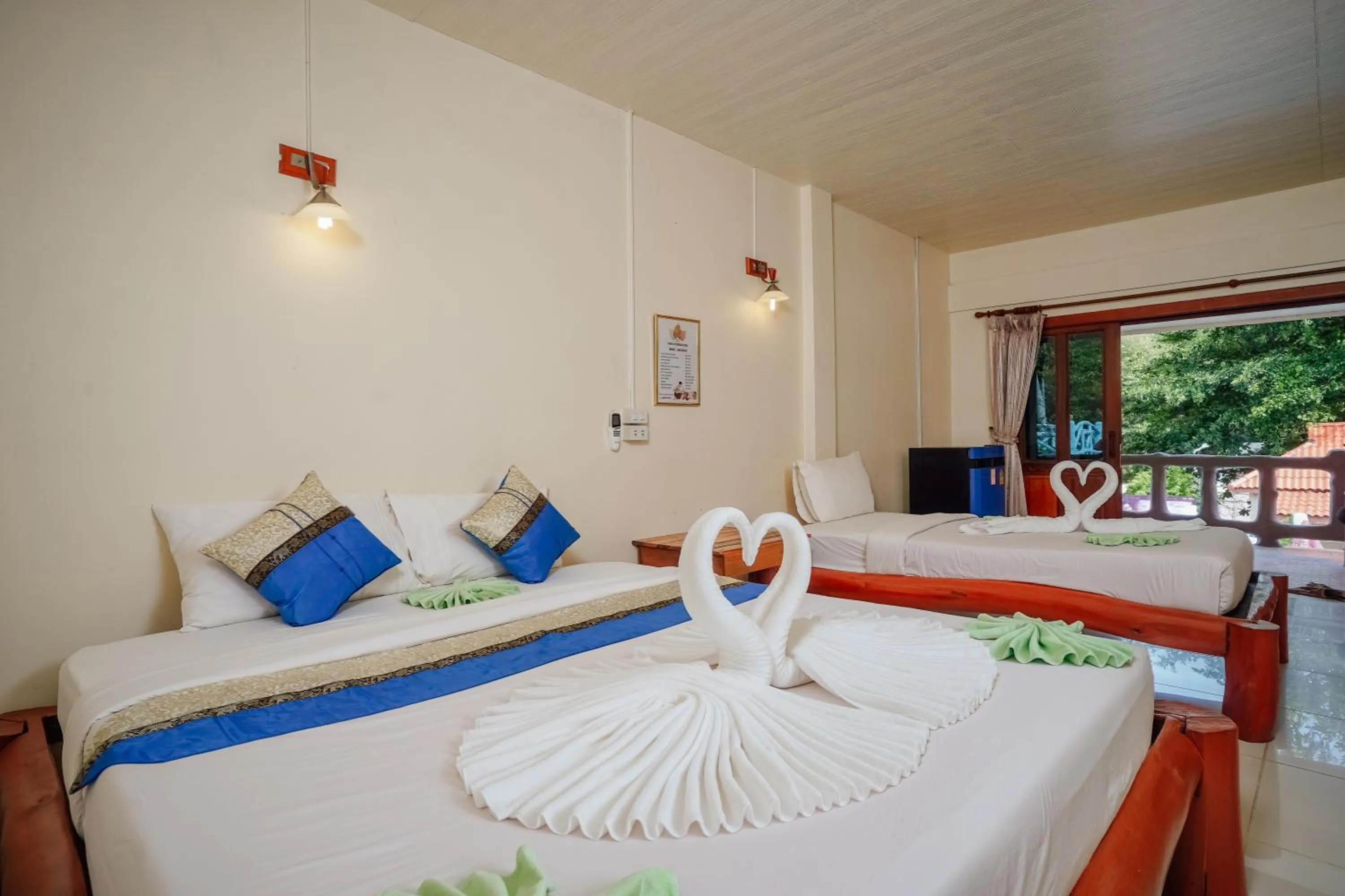 Bed in Paradise Bungalows