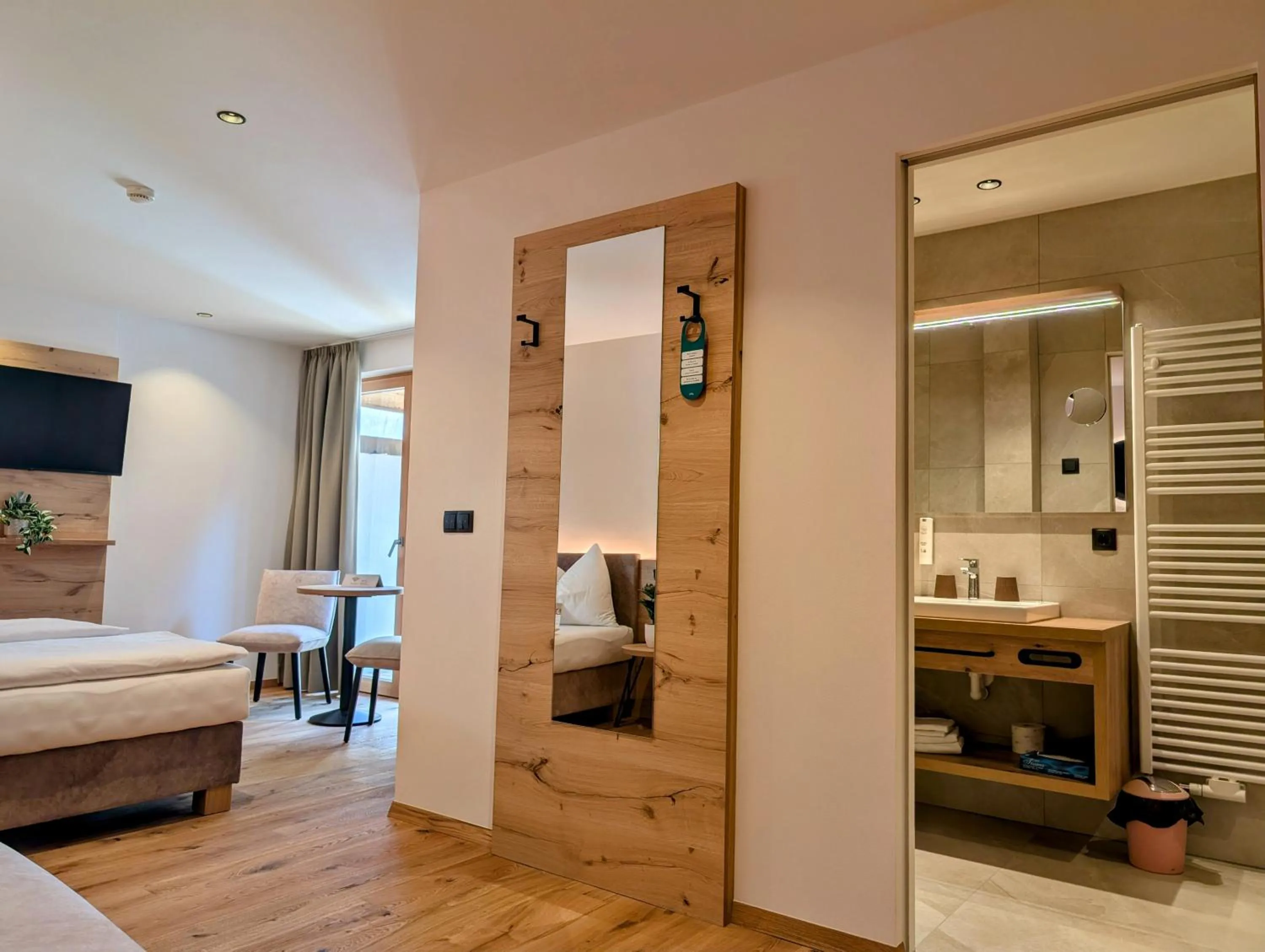 Bathroom, Bed in Hotel Schmuckhof