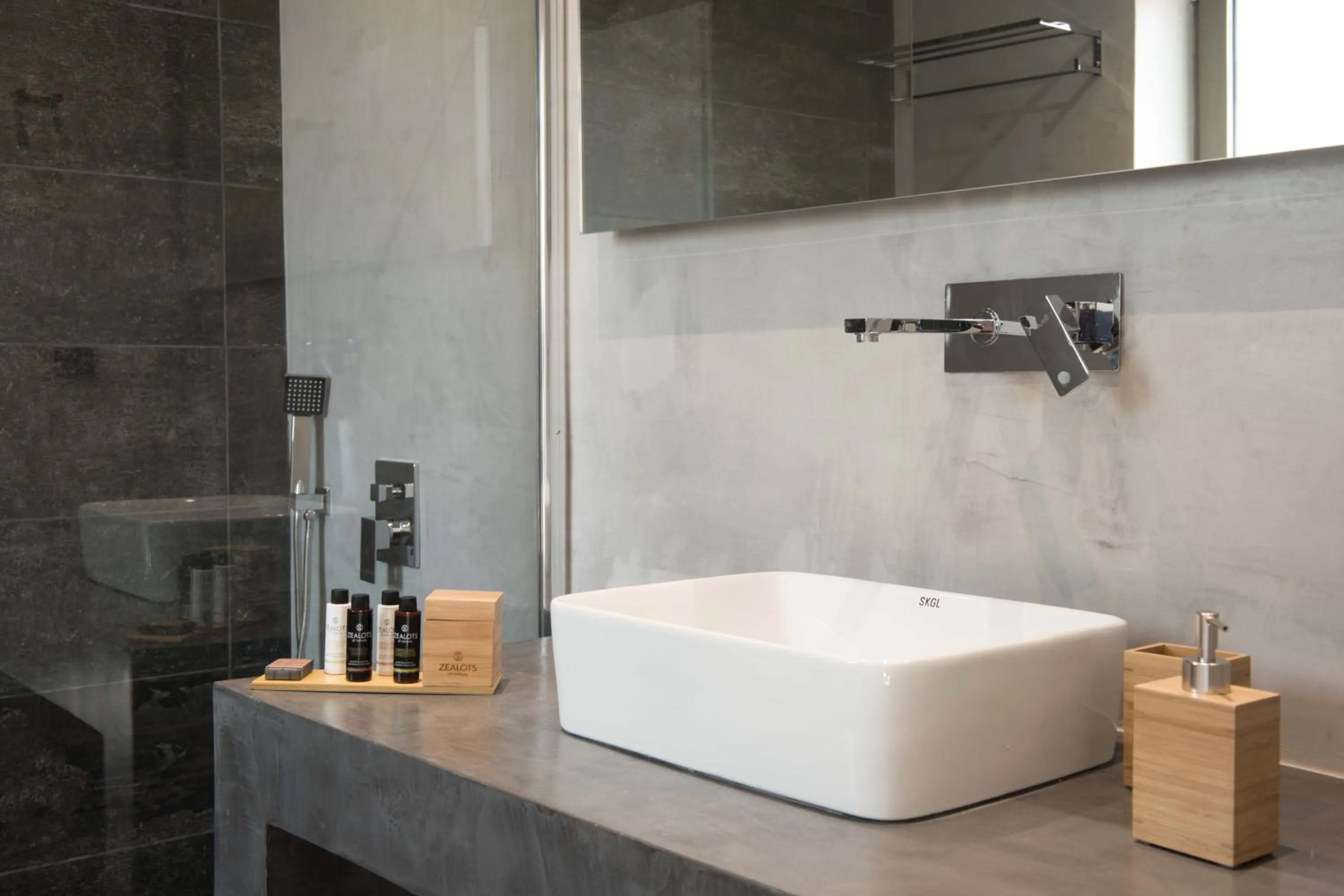 Bathroom in Calme Suites Mani