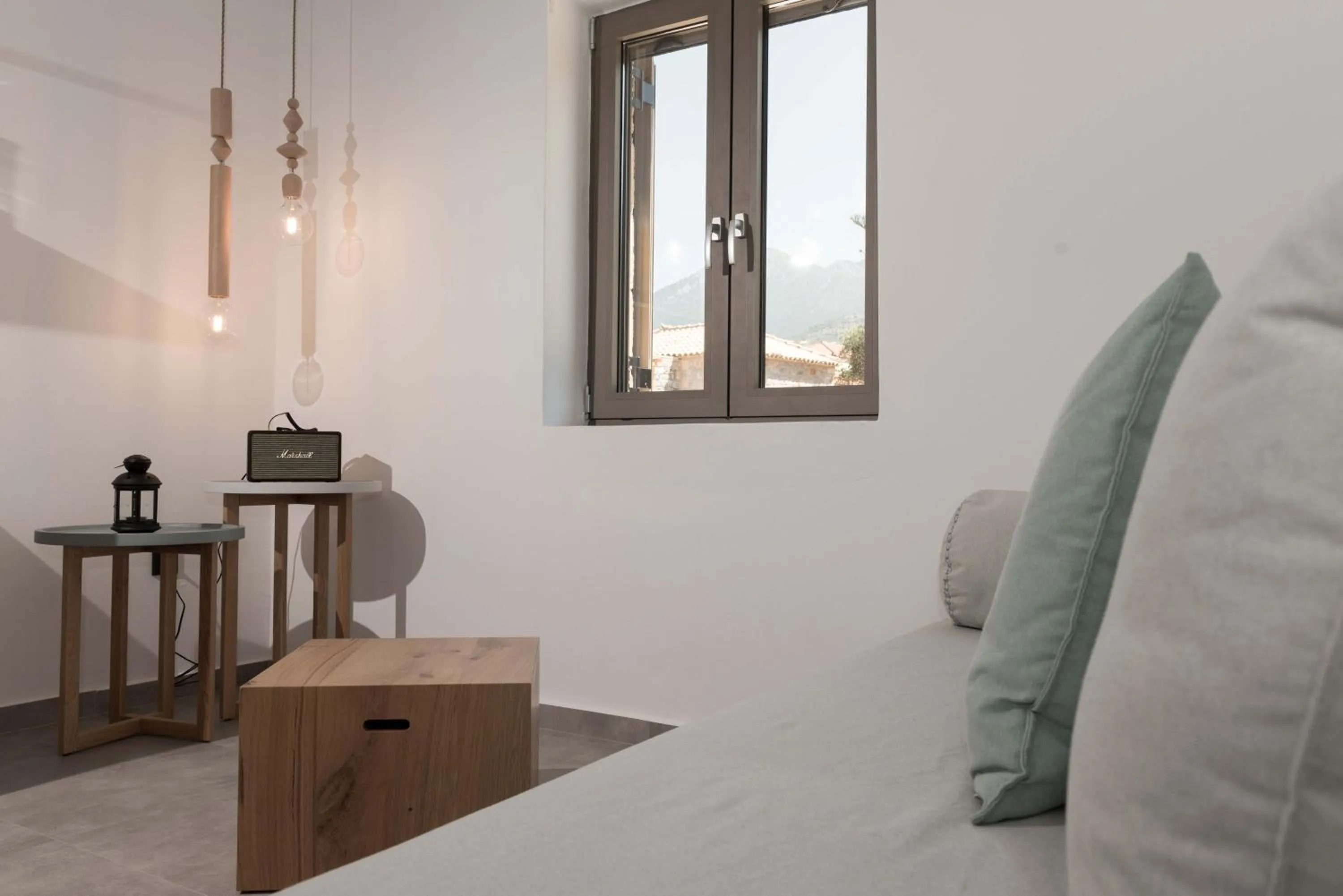 Living room, Bed in Calme Suites Mani