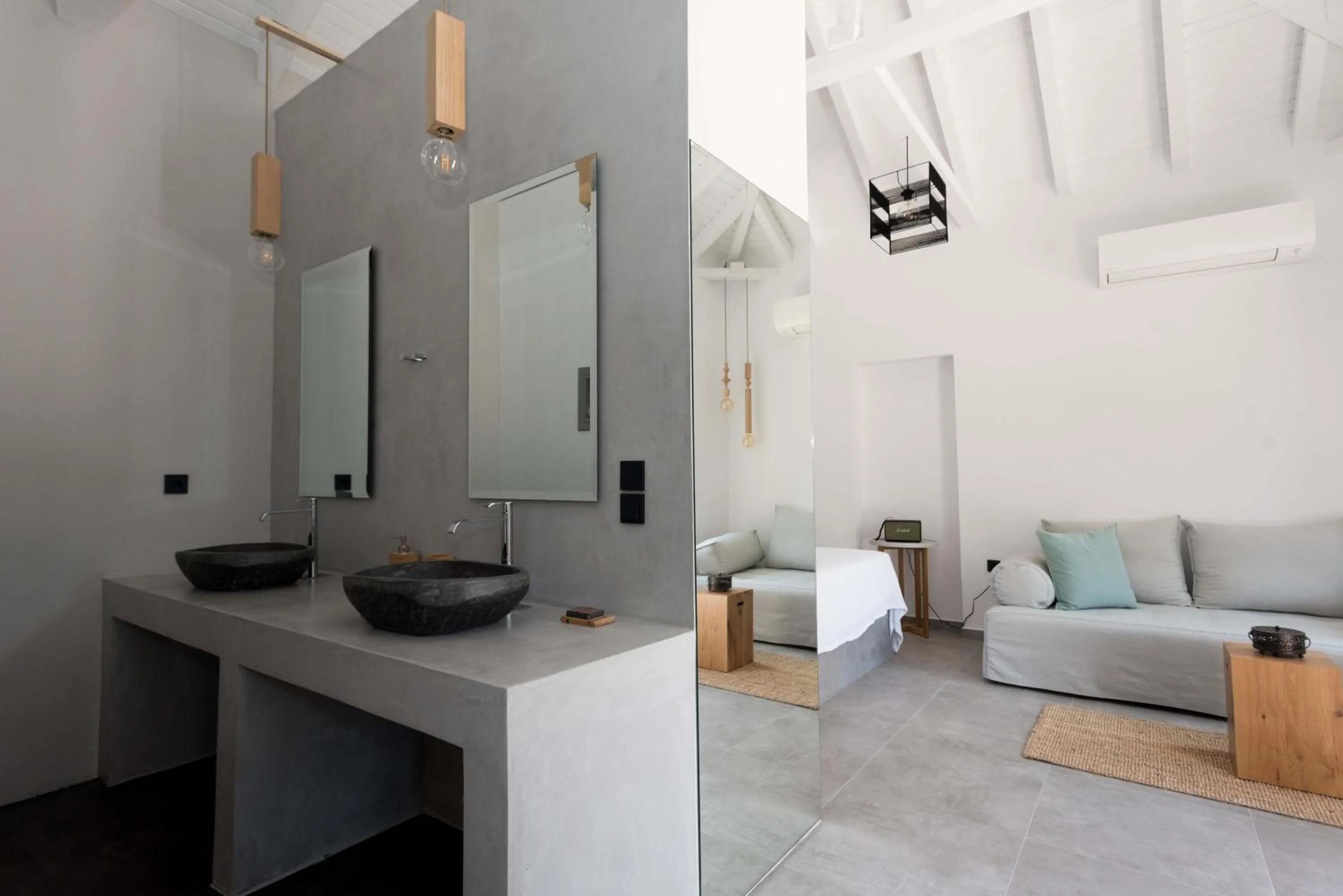 Photo of the whole room in Calme Suites Mani