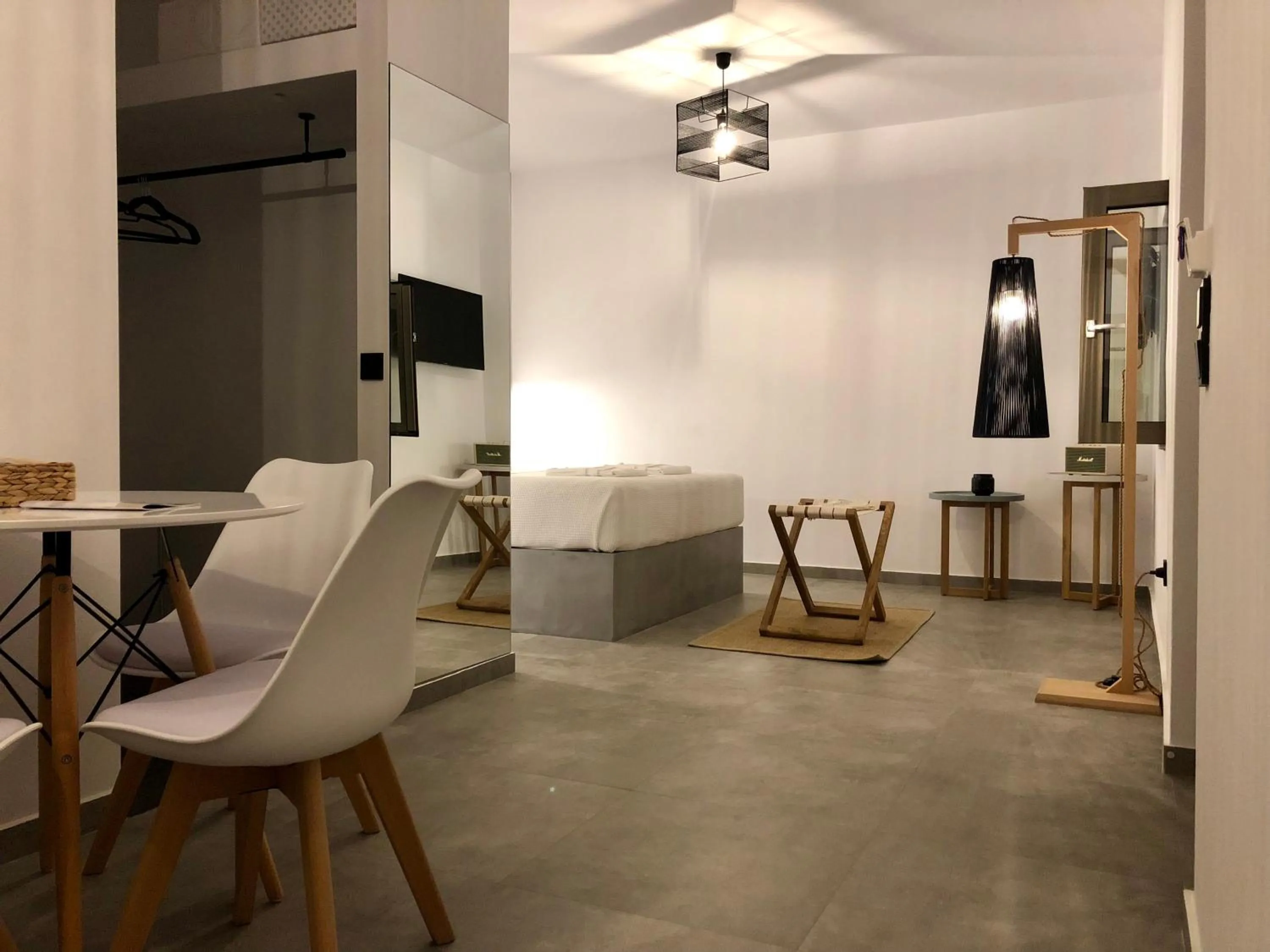 Photo of the whole room in Calme Suites Mani