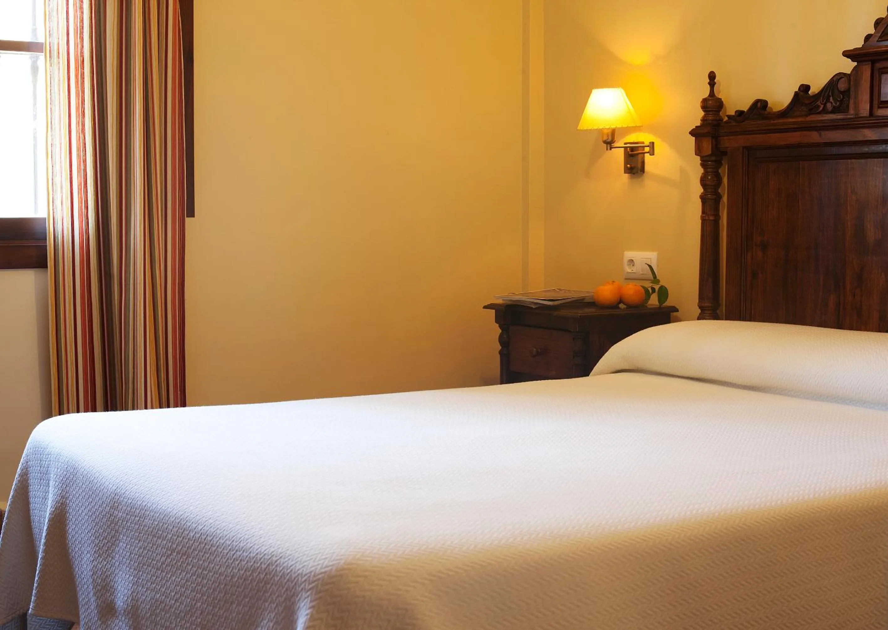 Bed in Hospedería Santiago