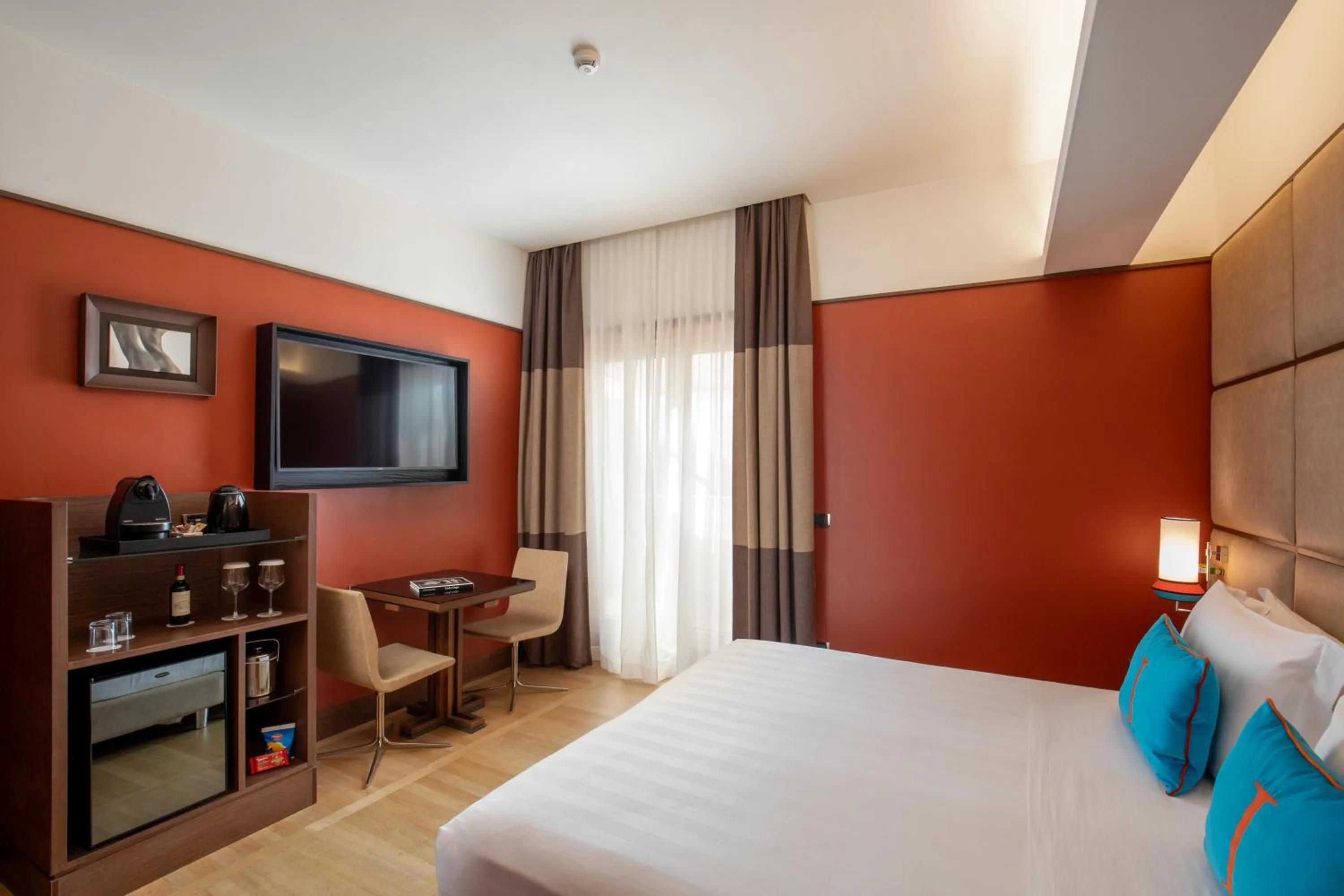 Bed in The Independent Hotel