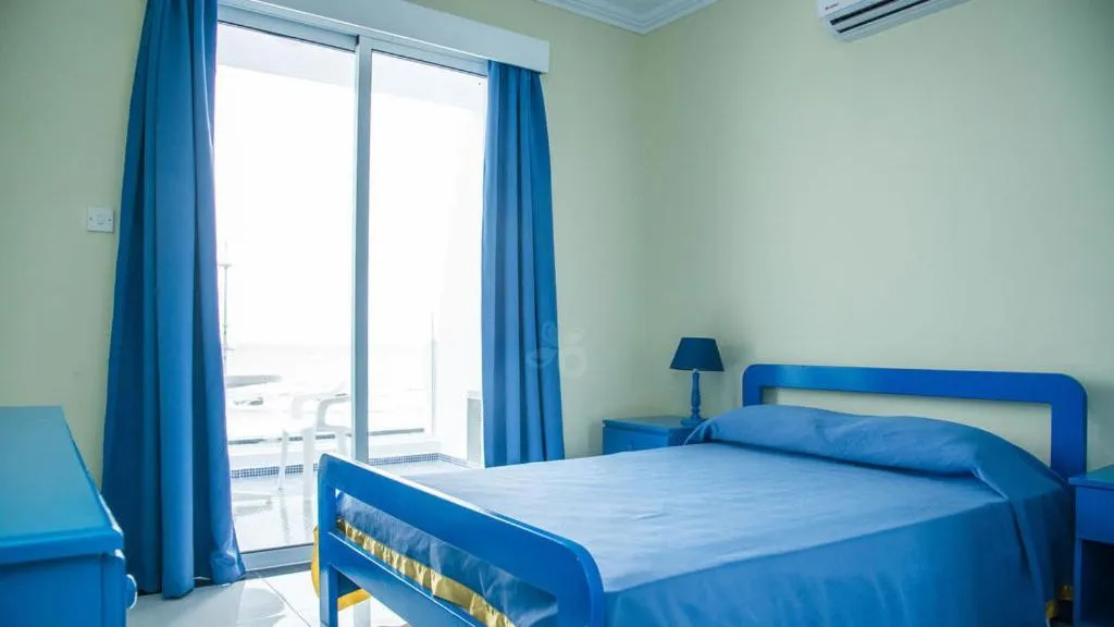 Bed in Paphinia SeaView Apartments