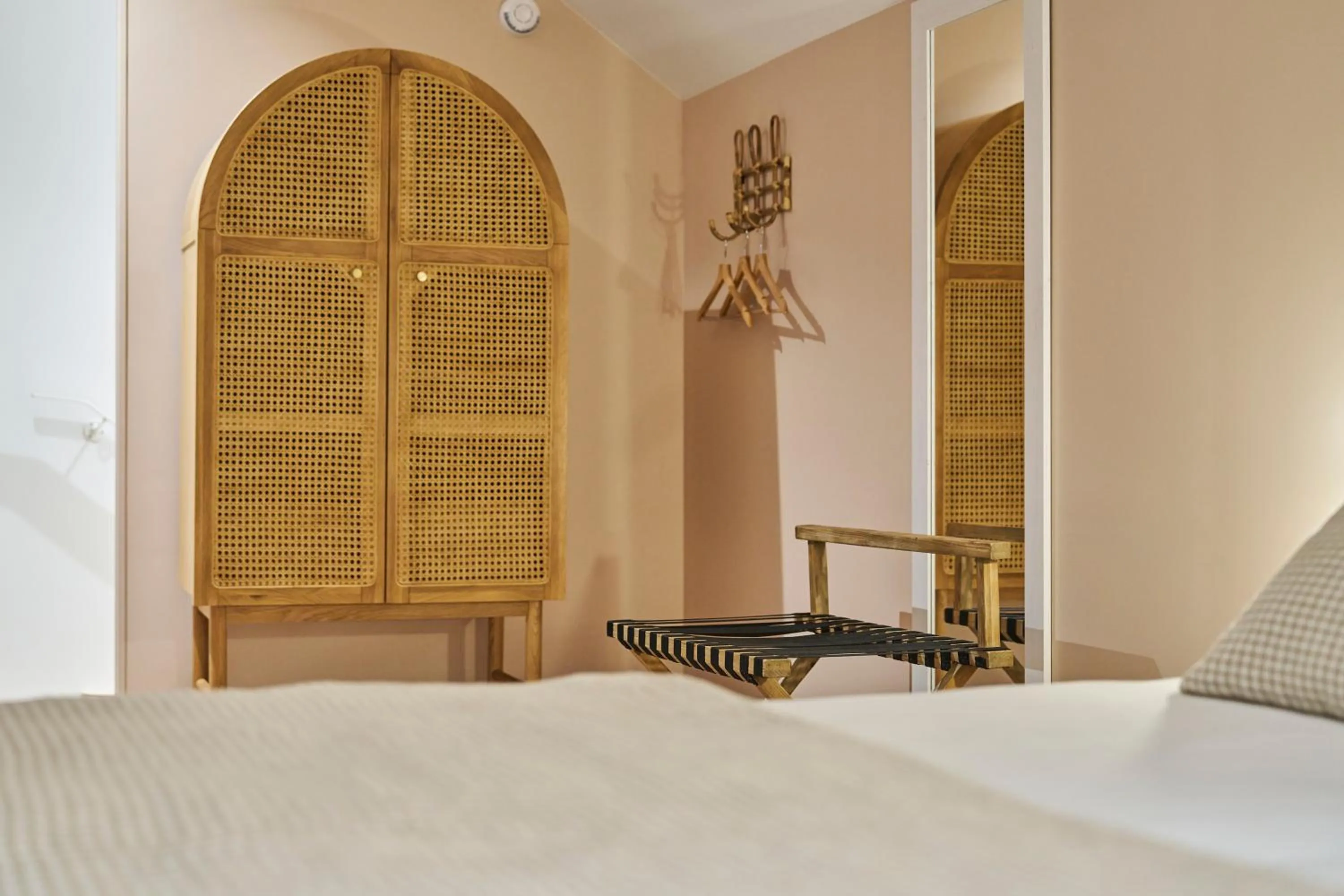 Decorative detail, Bed in Hôtel le Corbusson Laval Ouest