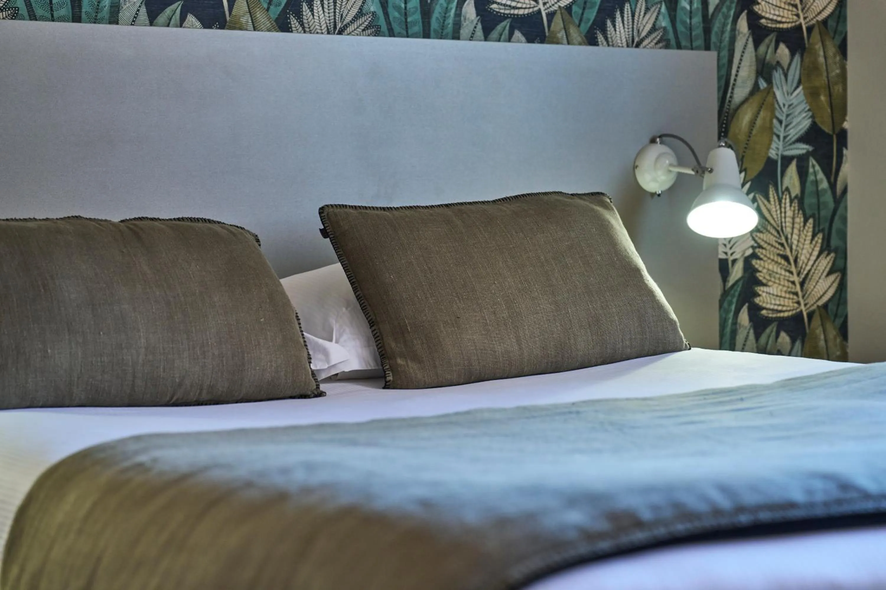 Bed in Hôtel le Corbusson Laval Ouest