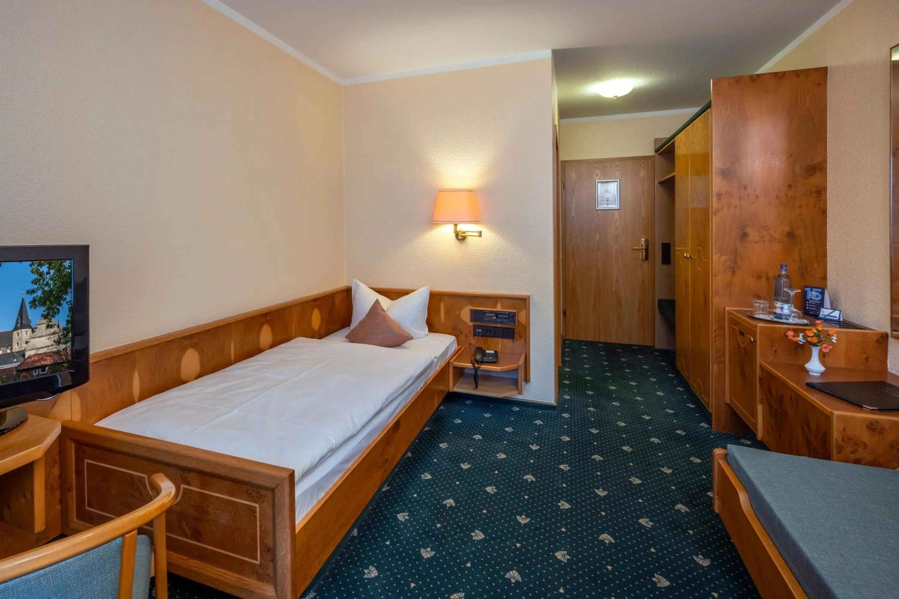 Living room, Bed in Hotel Simonshof