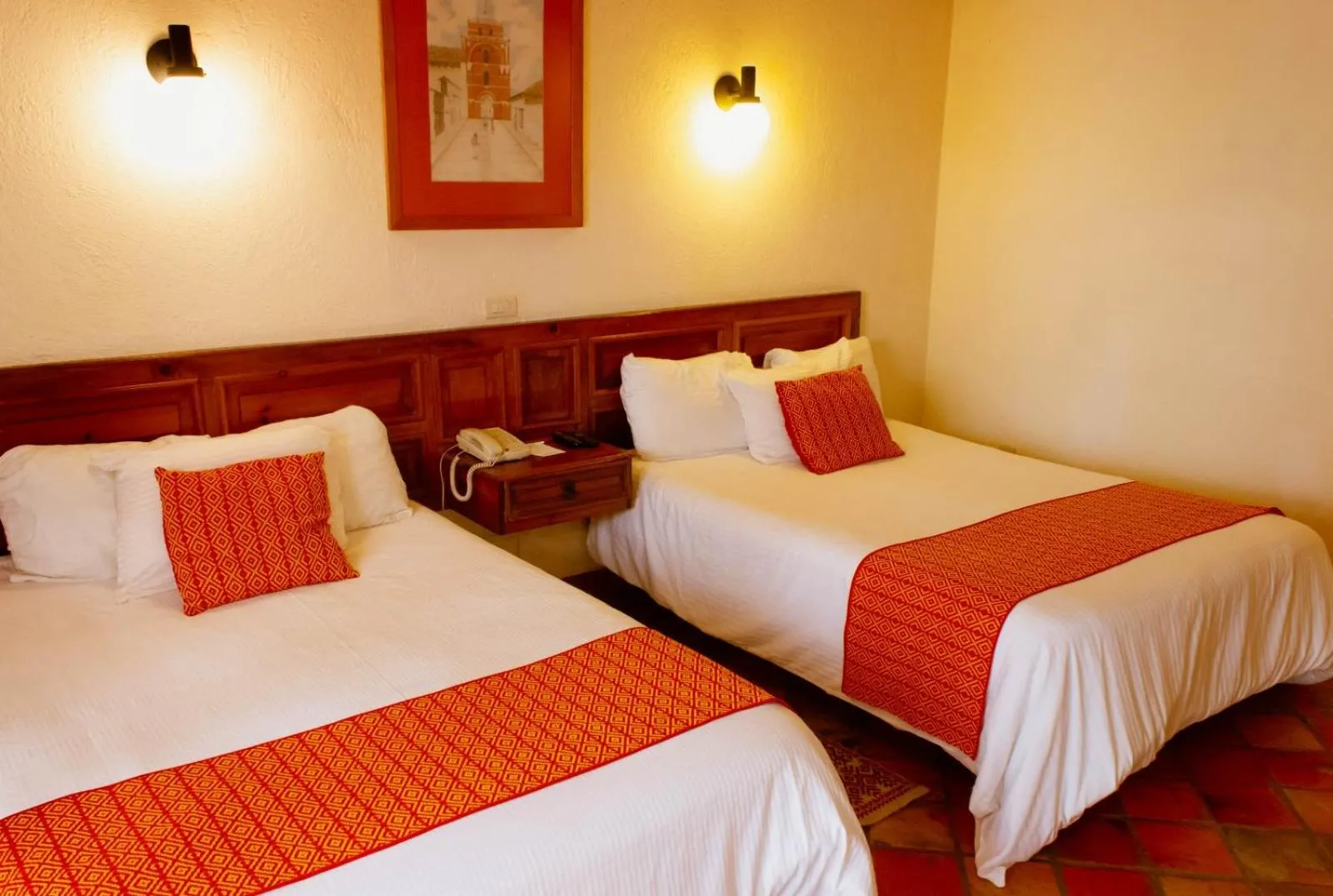 Bed in Hotel Diego de Mazariegos