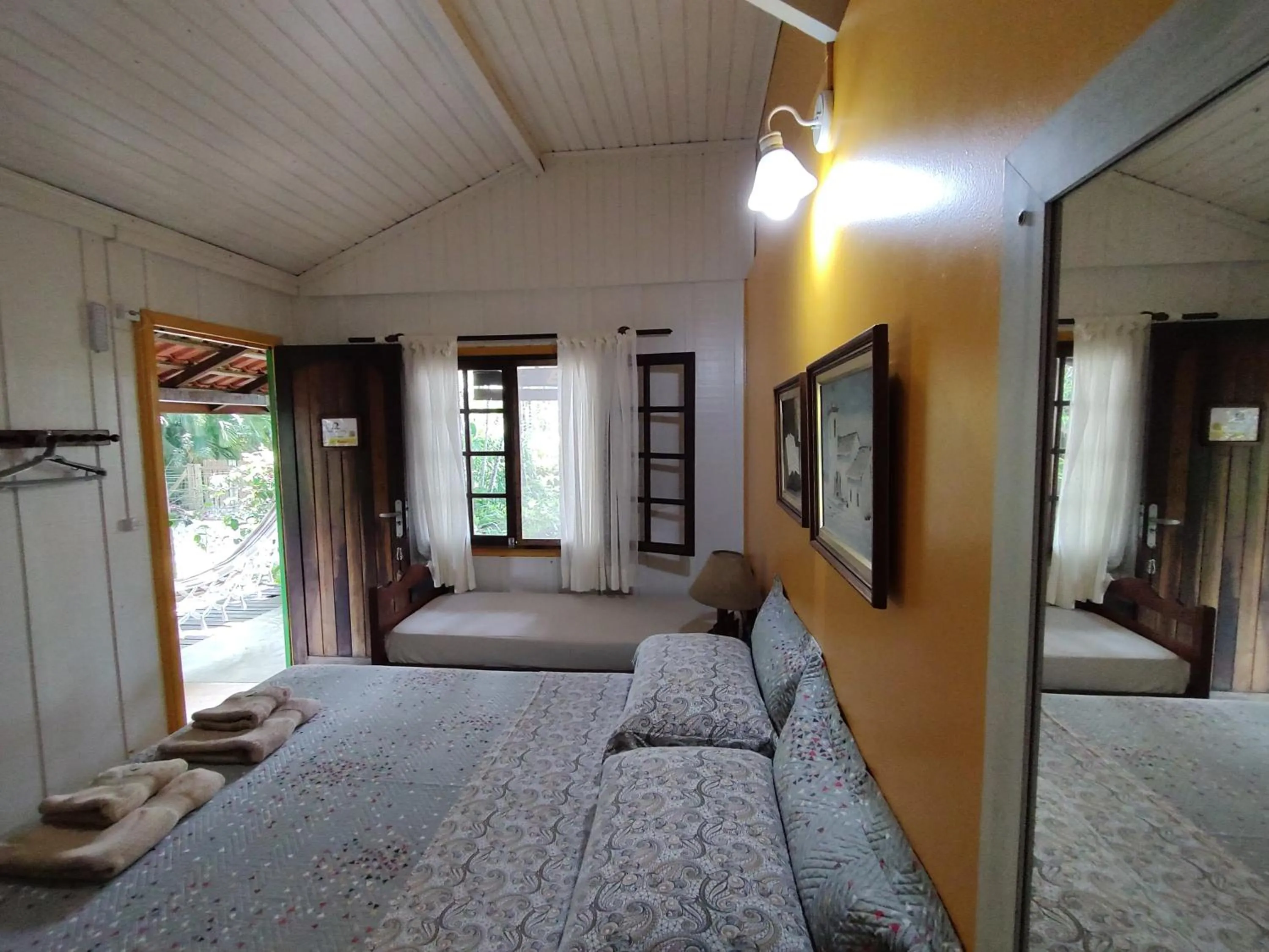 Bed in Pousada Enseada das Conchas